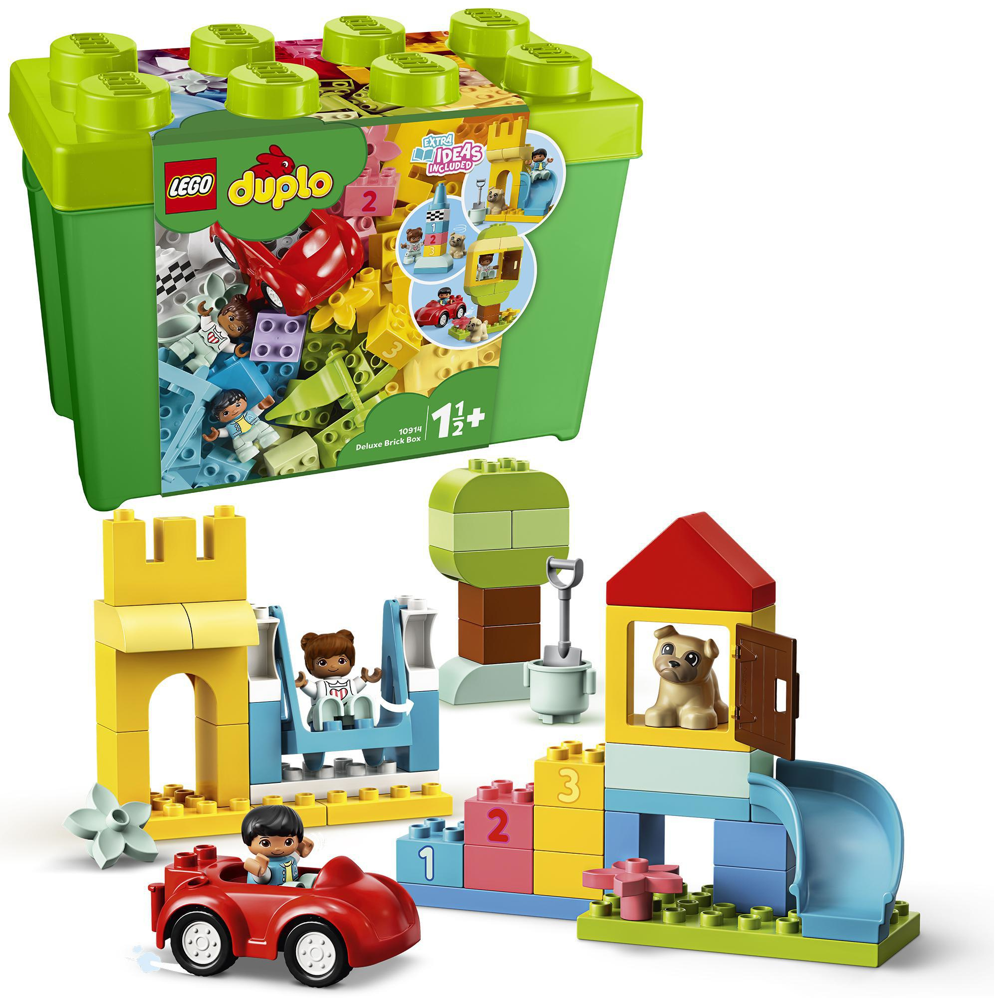 Zestaw LEGO Duplo z zielonym pudełkiem i różnymi kolorowymi klockami, figurkami i czerwonym samochodem.