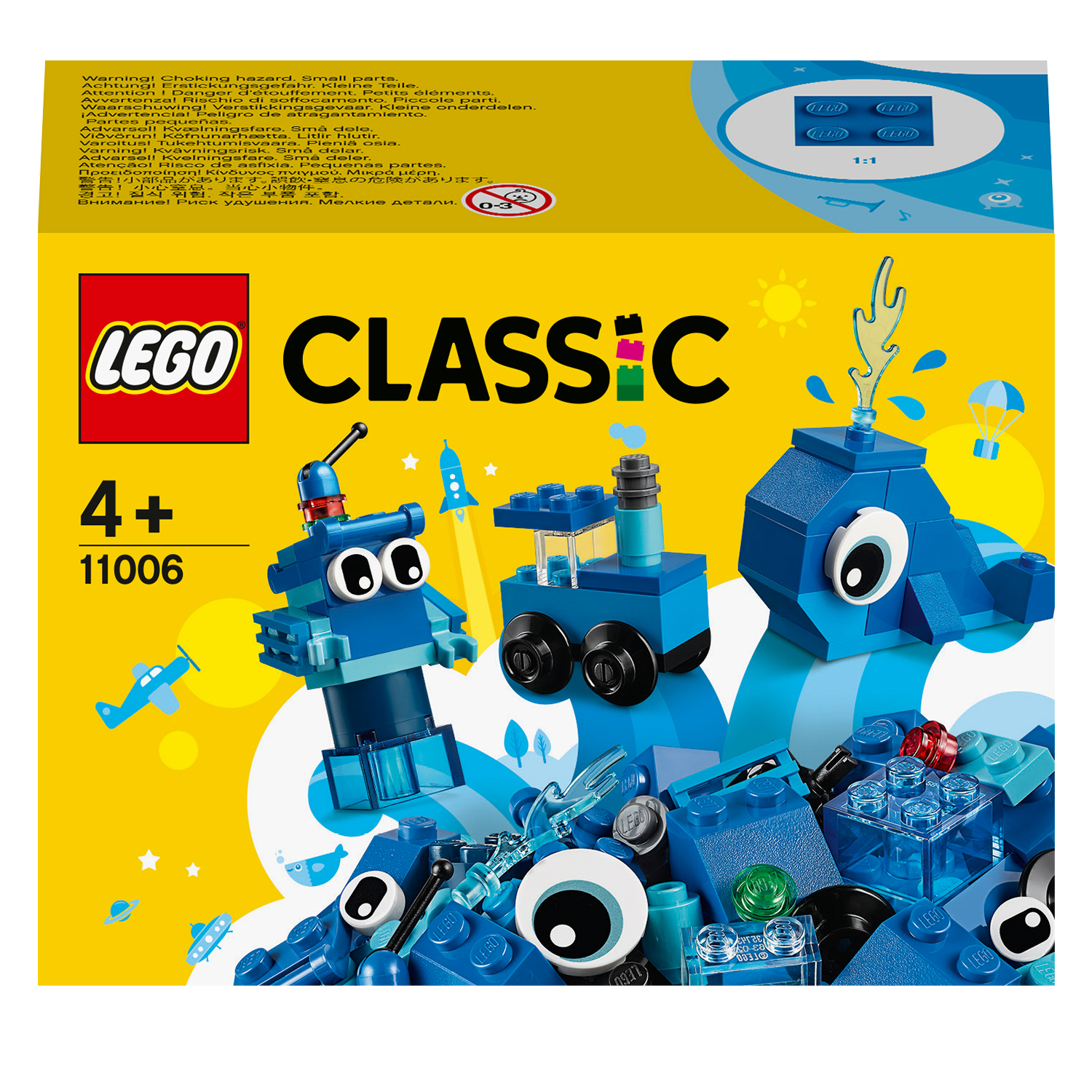 Ein LEGO Classic Set Karton, mit blauen Steinen und einer Cartoon-Lok und Wal.