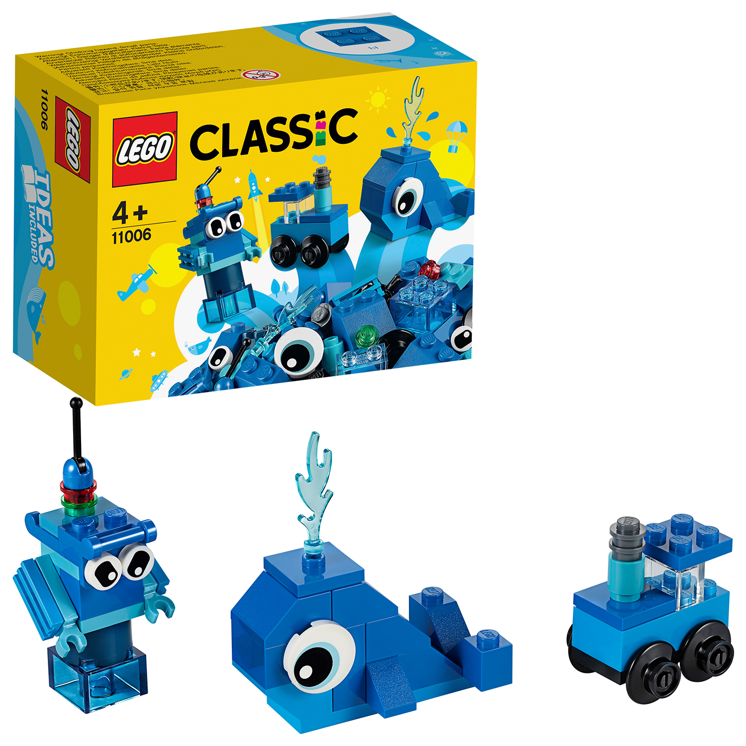 Lego Classic Box mit blauen Lego-Kreationen: ein Roboter, ein Wal und ein Fahrzeug.