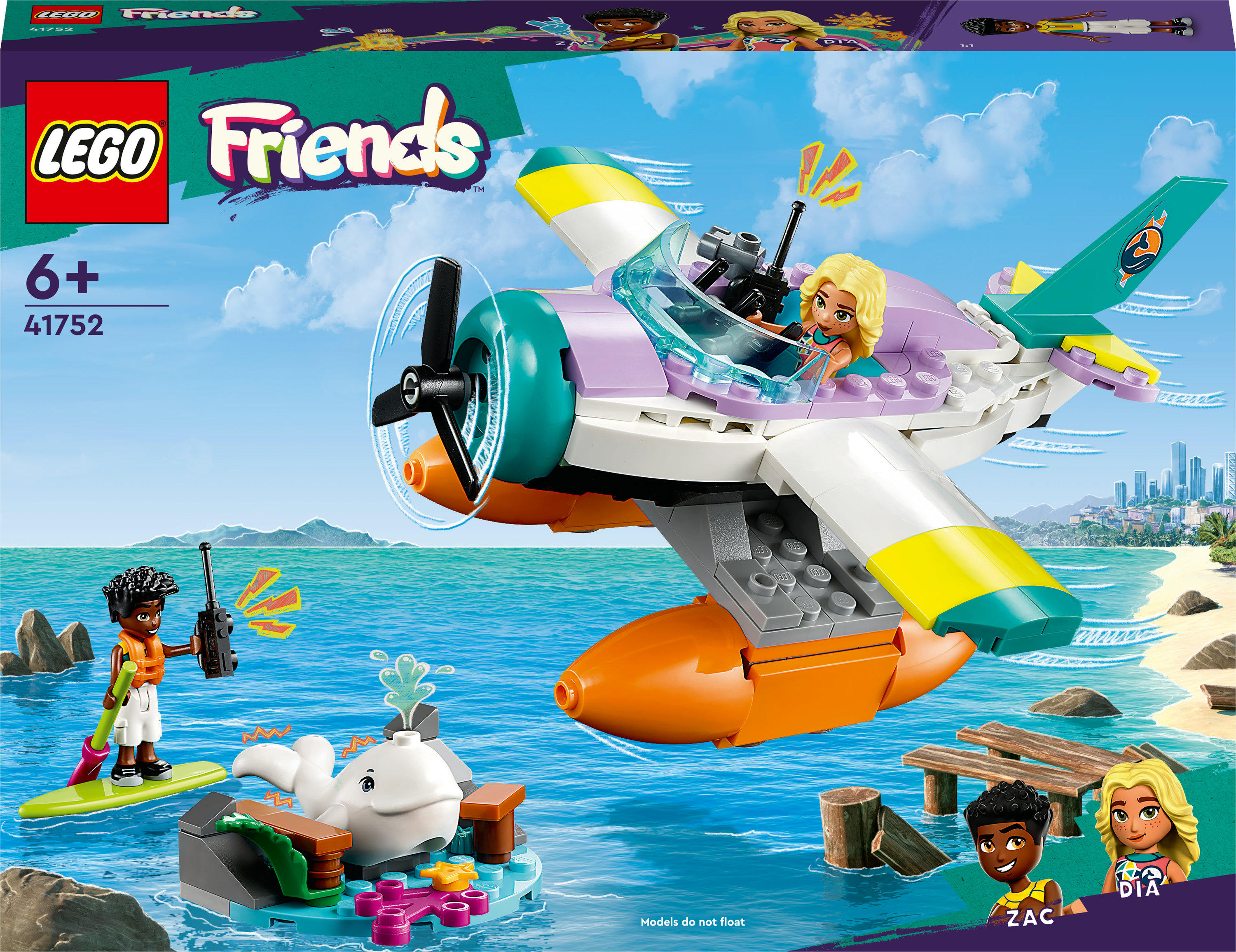 Ensemble Lego Friends avec avion, figurines et baleine sur l'eau.