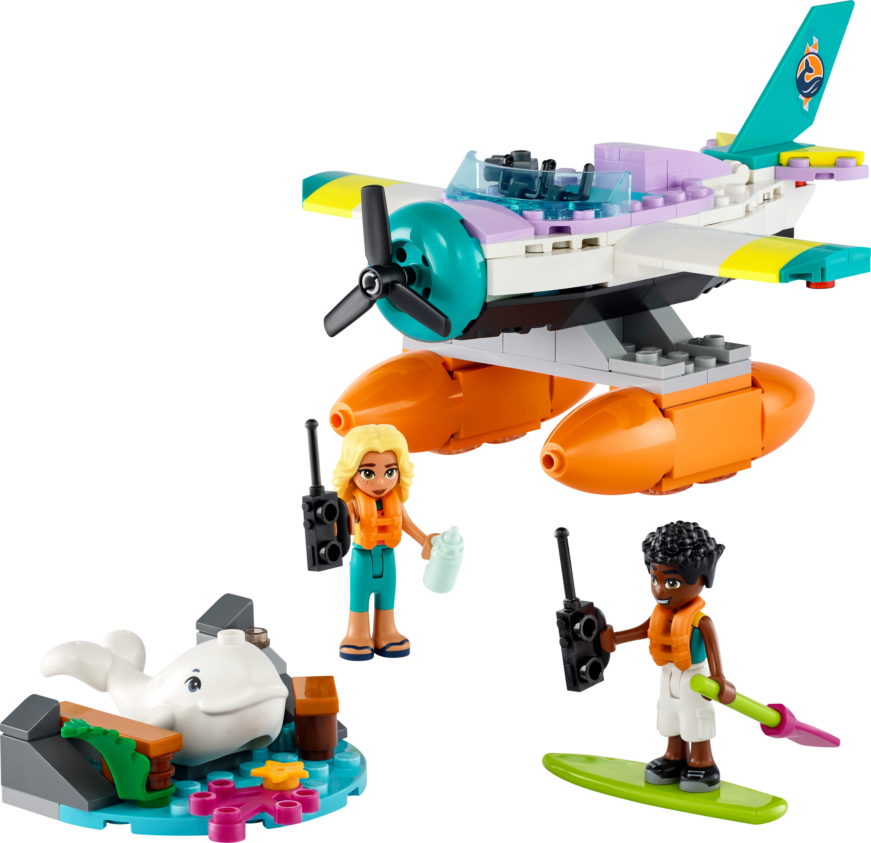 Ensemble Lego Friends avec hydravion, figurines, une baleine et une scène de jetée.