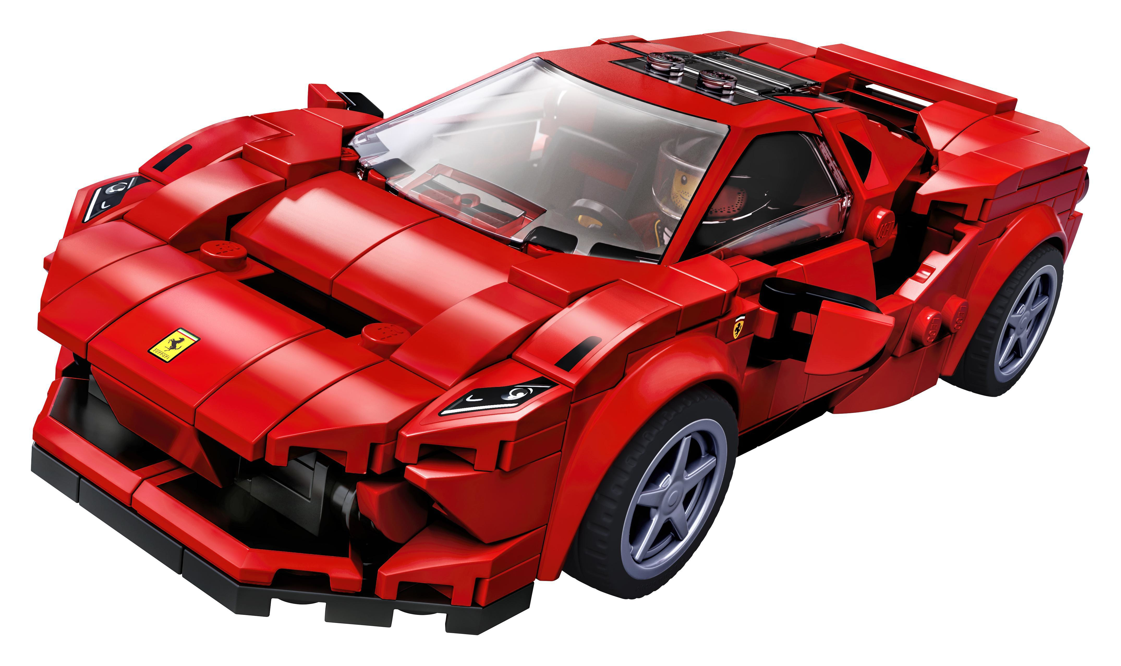 Auto sportiva Lego rossa con design dettagliato, su sfondo bianco.