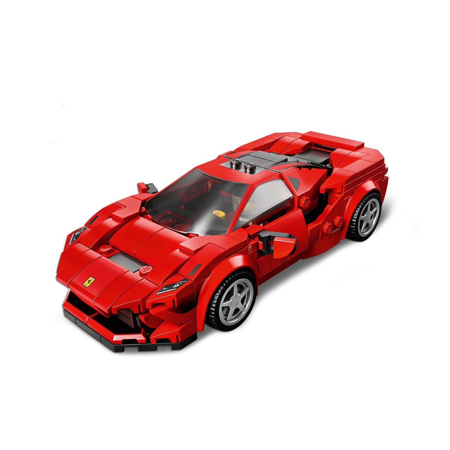 Modello di auto Lego Ferrari rossa su sfondo bianco con focus sui dettagli.