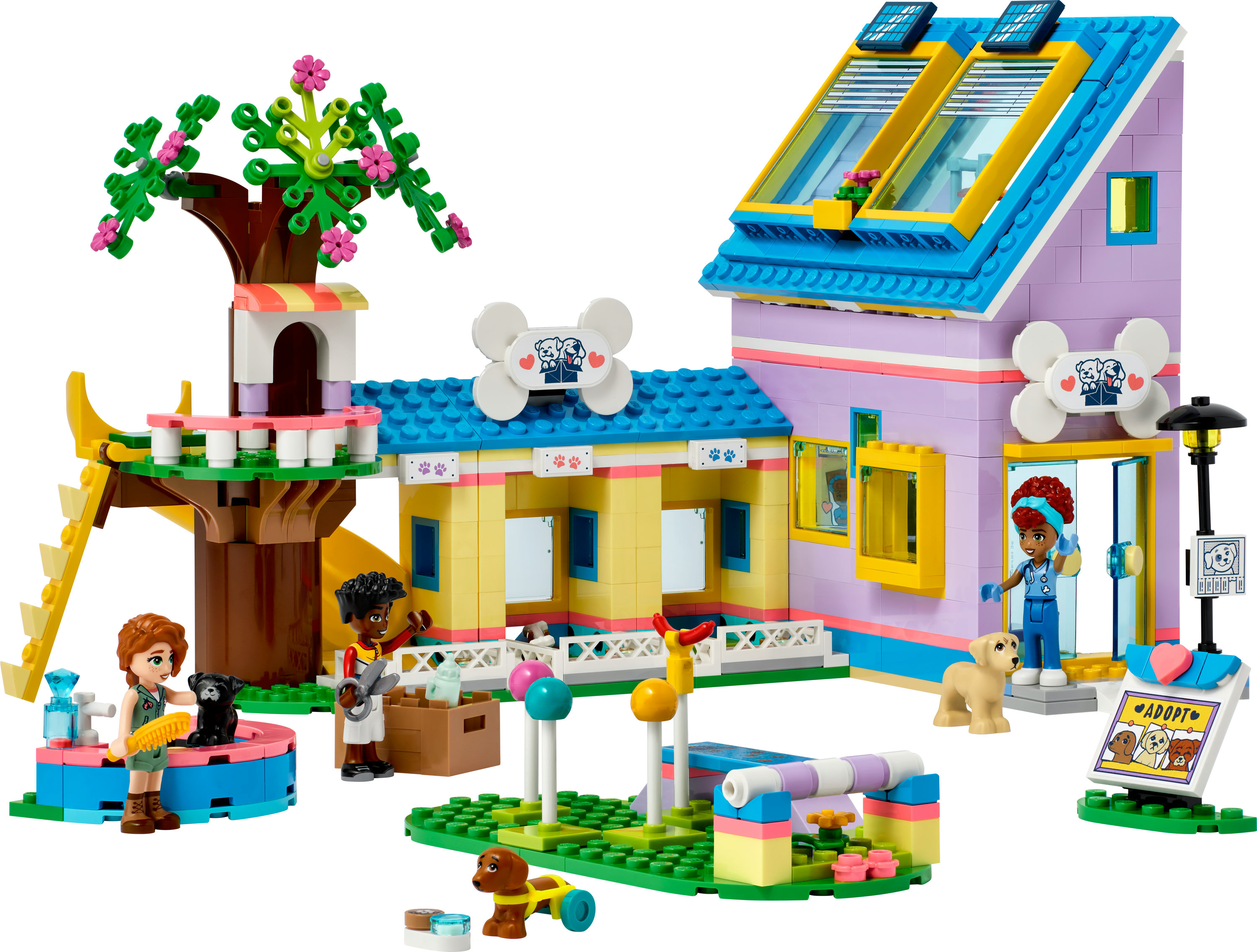 LEGO Friends evcil hayvan merkezi. Ağaç, kaydırak ve hayvanlar ve aksesuarlarla etkileşimde bulunan çeşitli minifigürlerle bina.