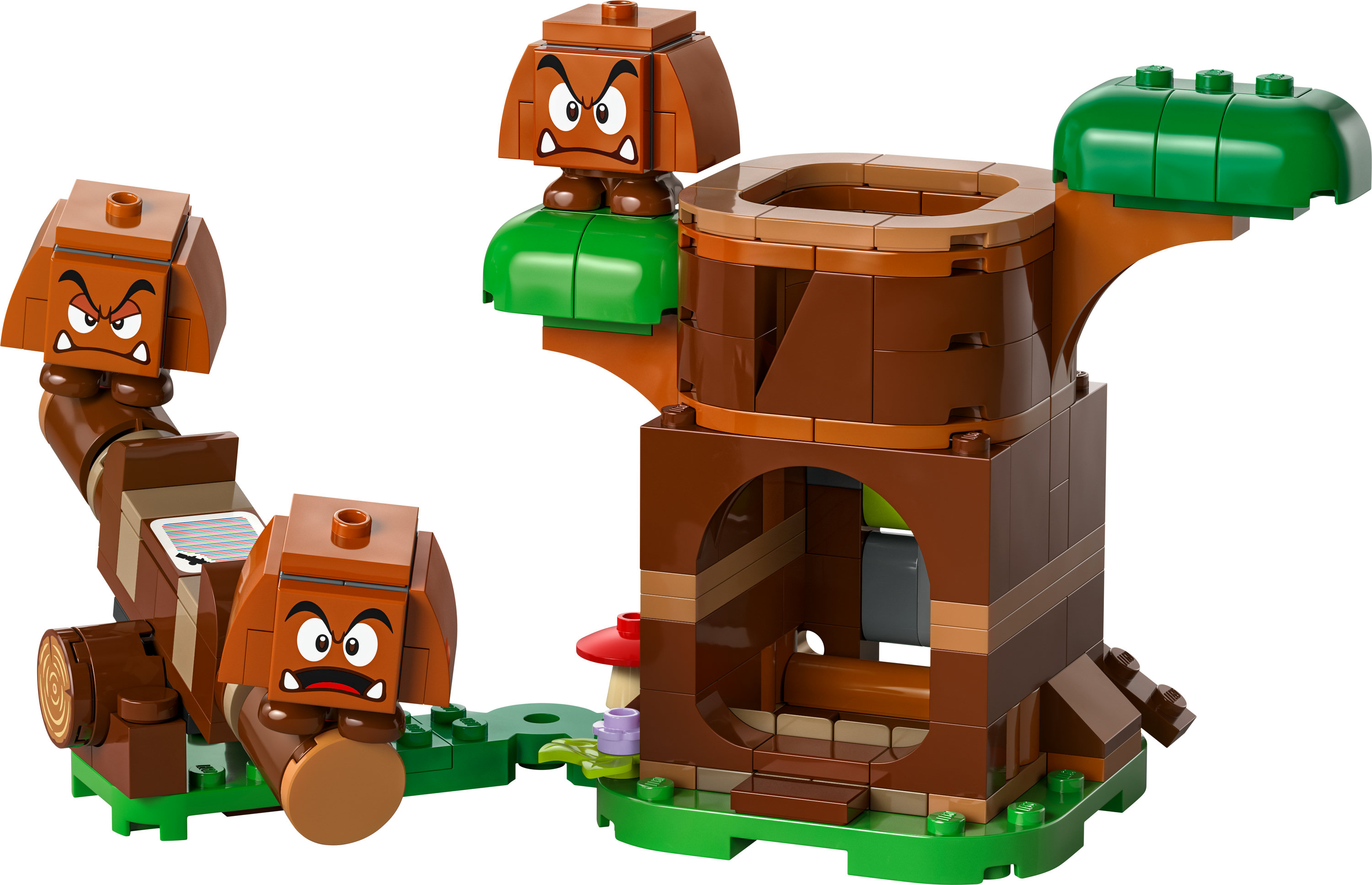 Ein Lego Super Mario Set mit Gumbas, einem Baum und einer Plattform aus braunen Legosteinen.