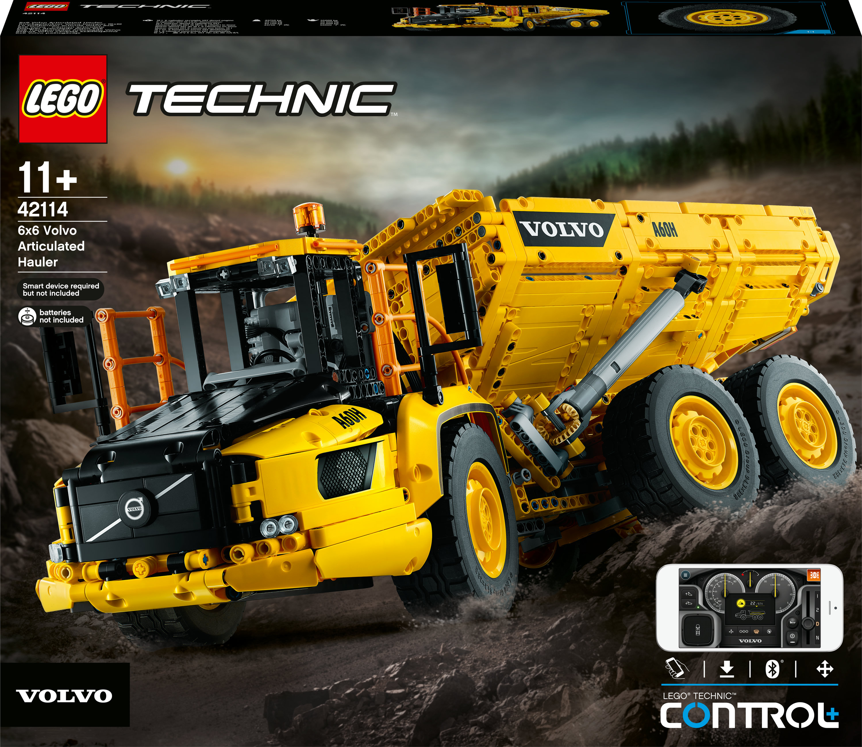Un grande camion Lego Technic giallo. Il set presenta un grande dumper articolato. La scatola è a sinistra.