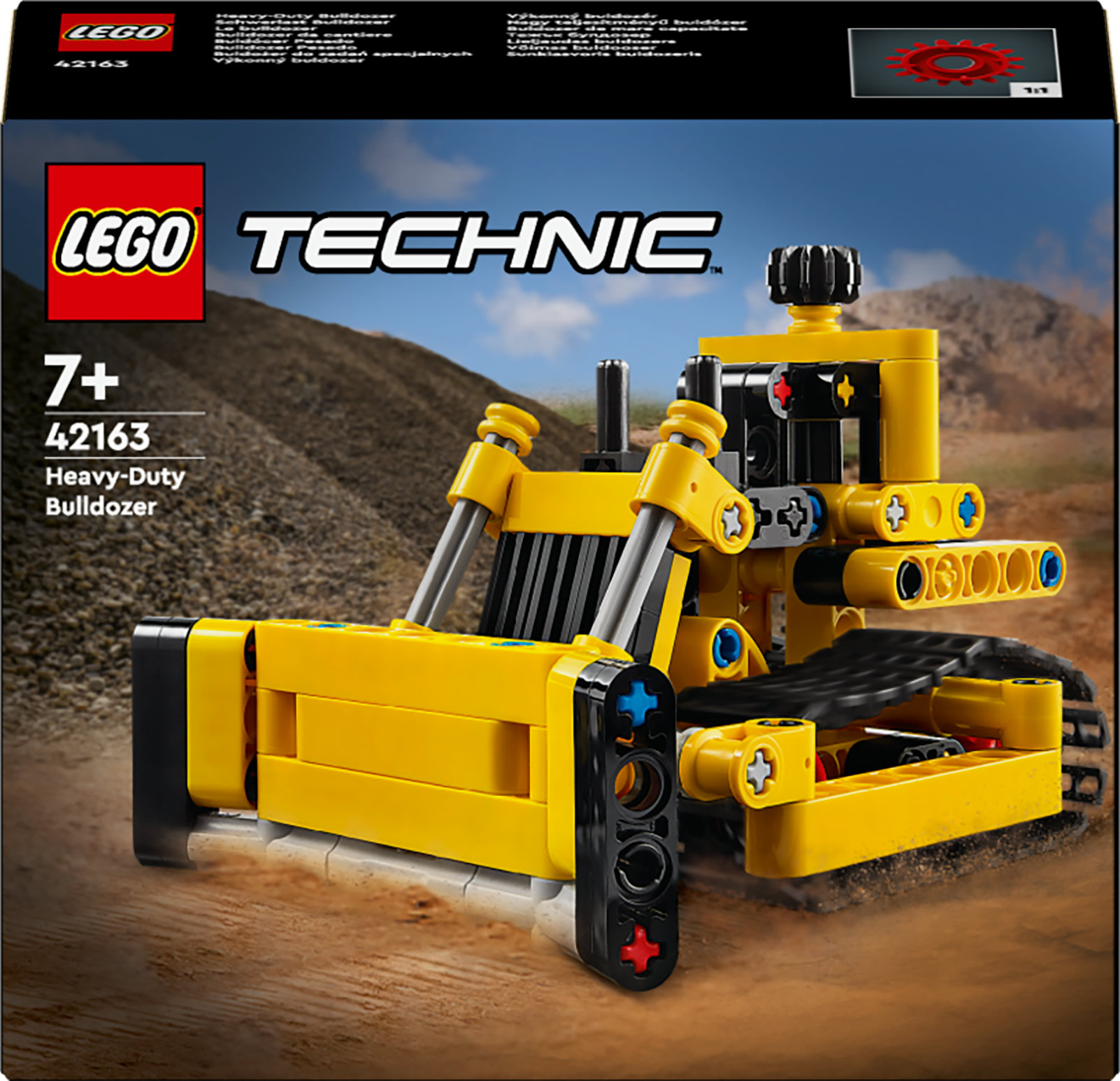 Set Lego Technic Bulldozer per impieghi gravosi. Dominano i colori giallo e nero. Vista frontale della scatola.