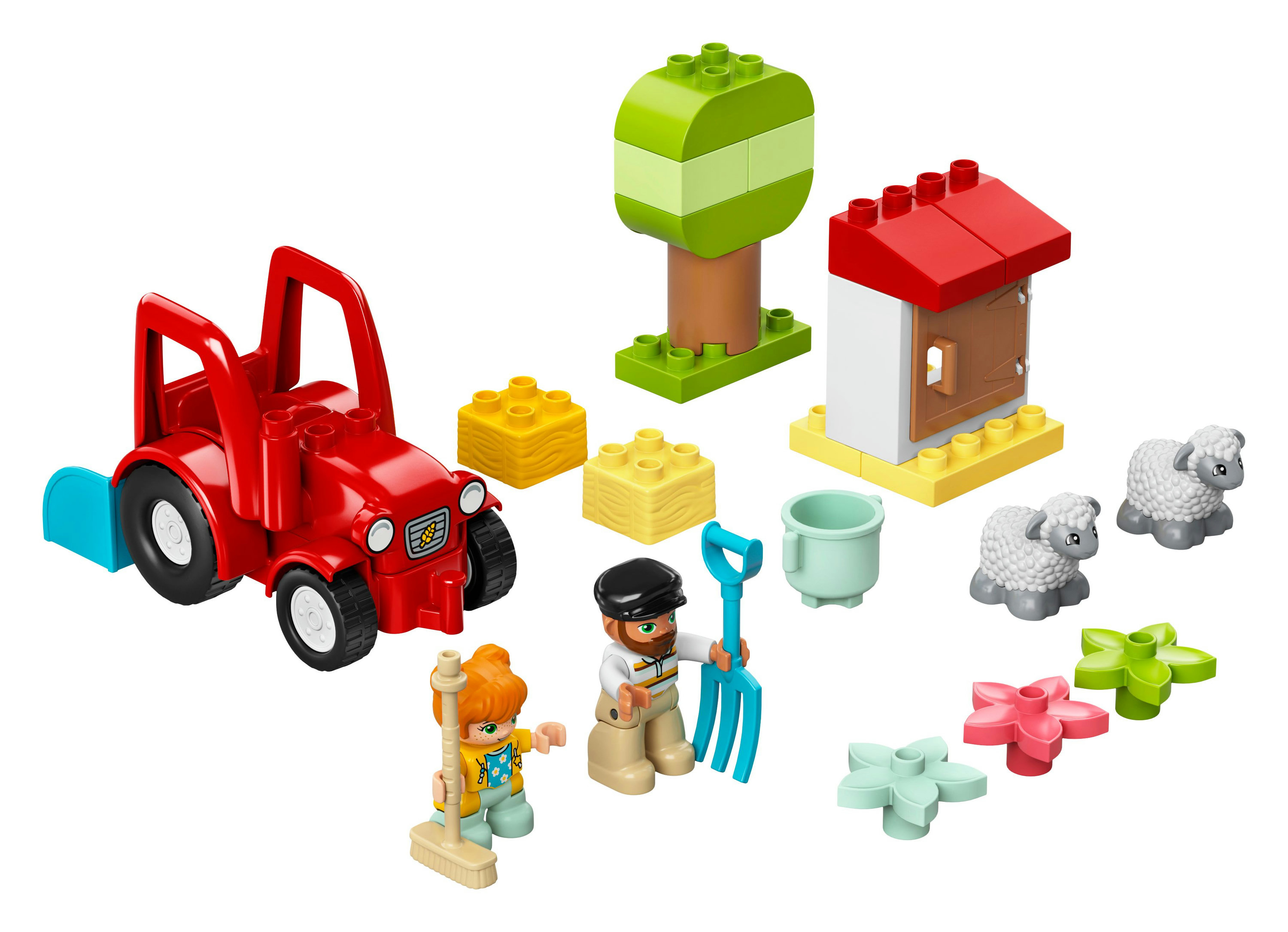Ein Lego Duplo Set mit rotem Traktor, Figuren, Bauernelementen.