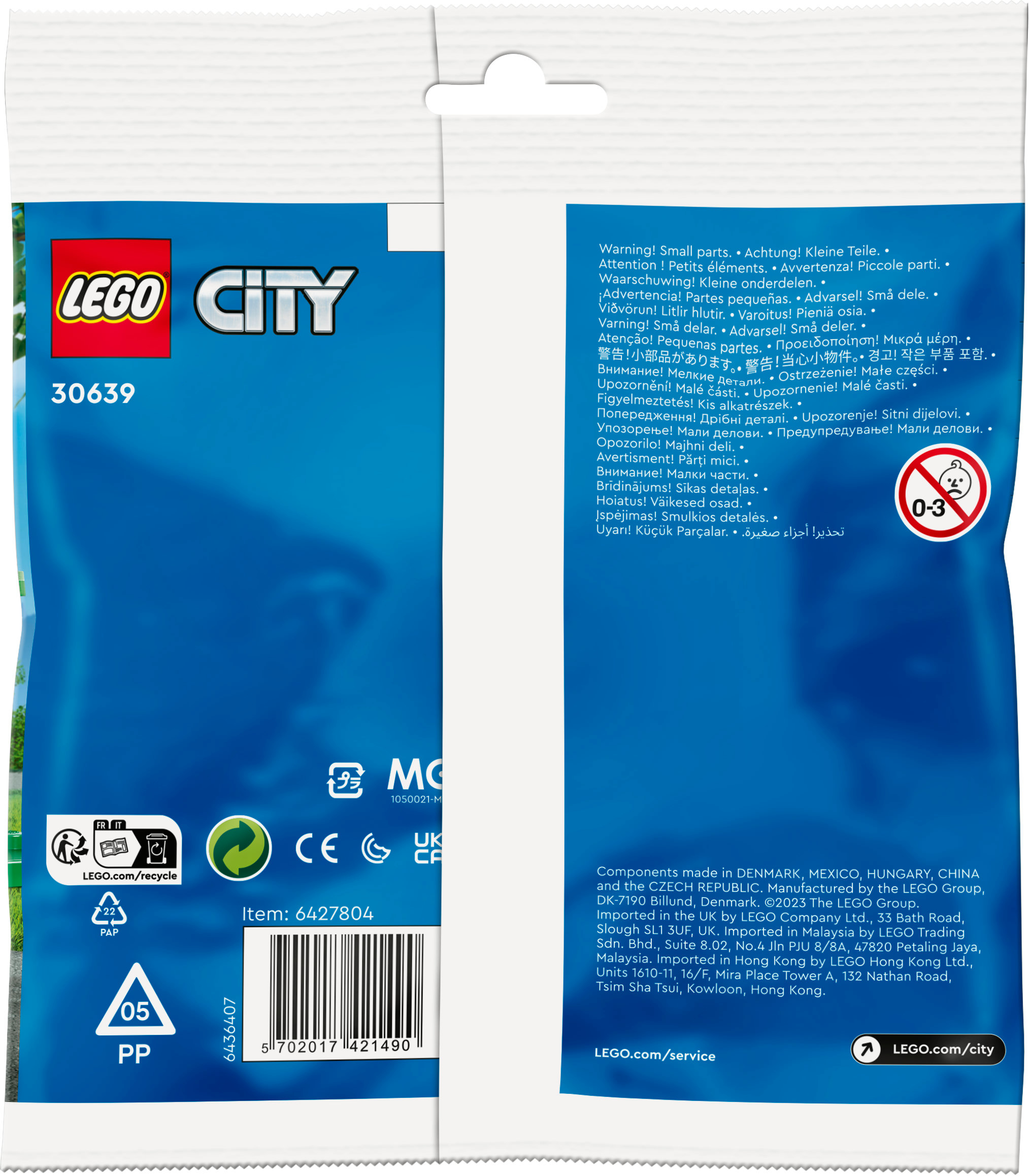 LEGO City çantasının arkası, çoklu dilde uyarılar ve bilgiler. Bir geri dönüşüm logosu içerir.