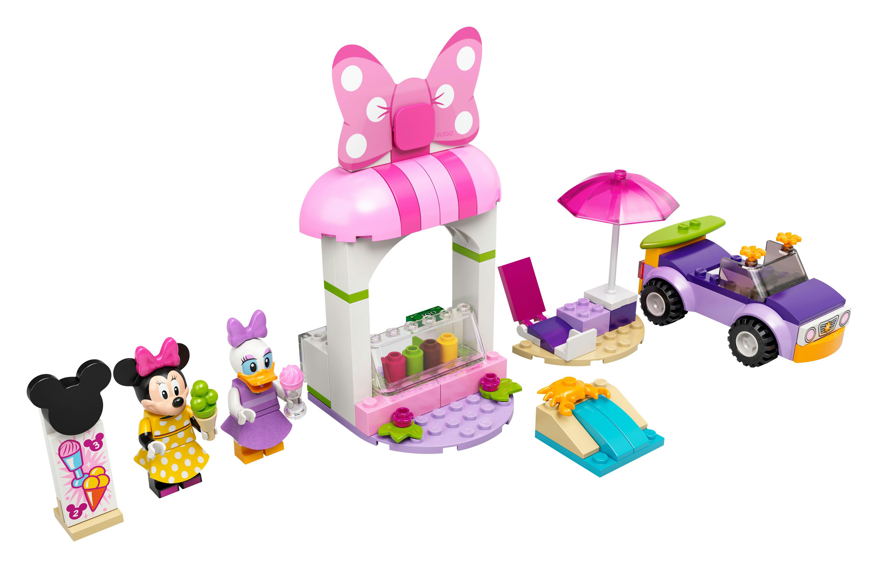 LEGO set with Minnie and Daisy figures, a beach scene, ice cream stand, car, and accessories.