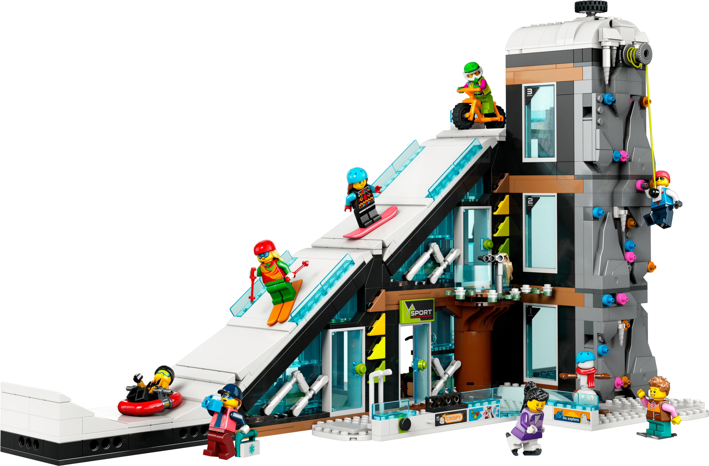 Un set LEGO con personaggi su una pista da sci con un edificio e altre strutture.