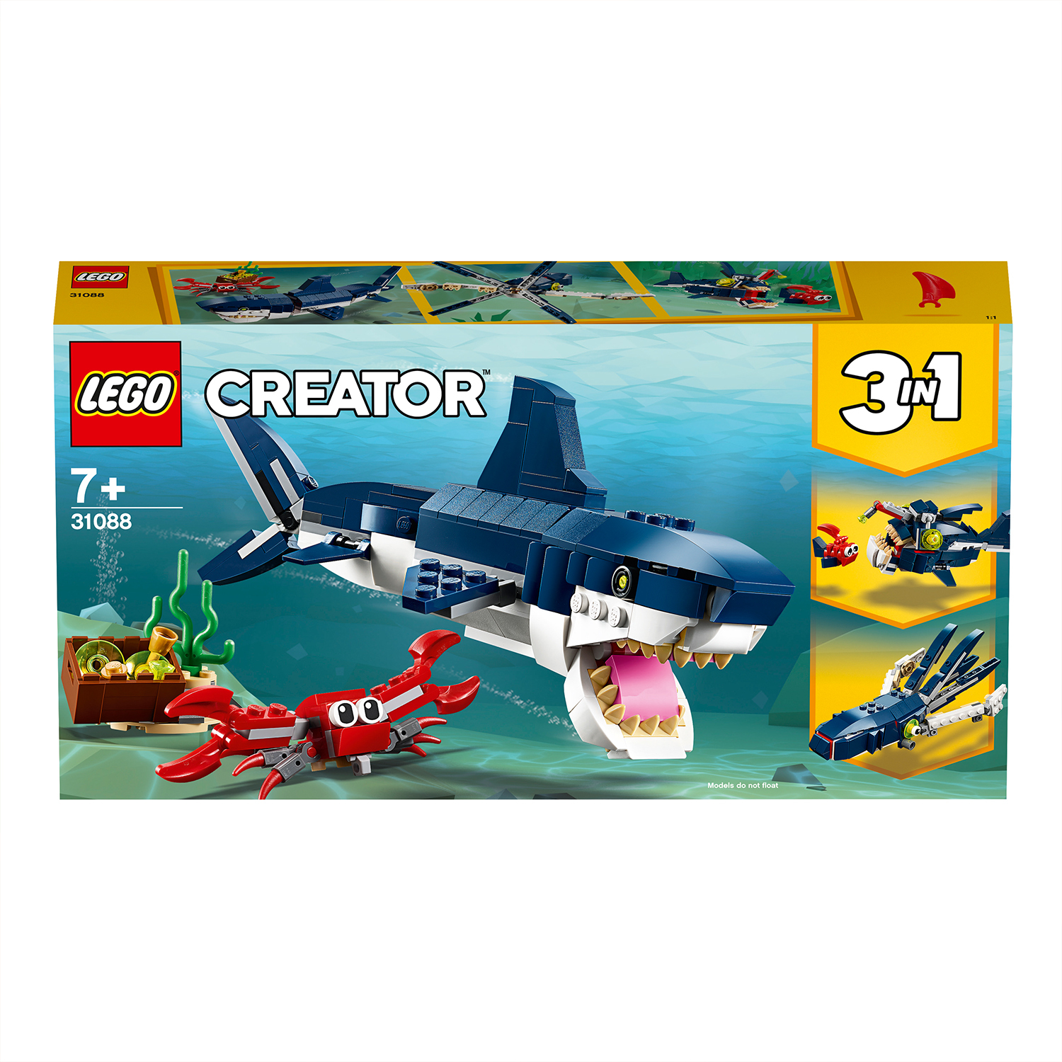 Zestaw Lego Creator z rekinem, czerwonym krabem i różnymi modelami podwodnymi.