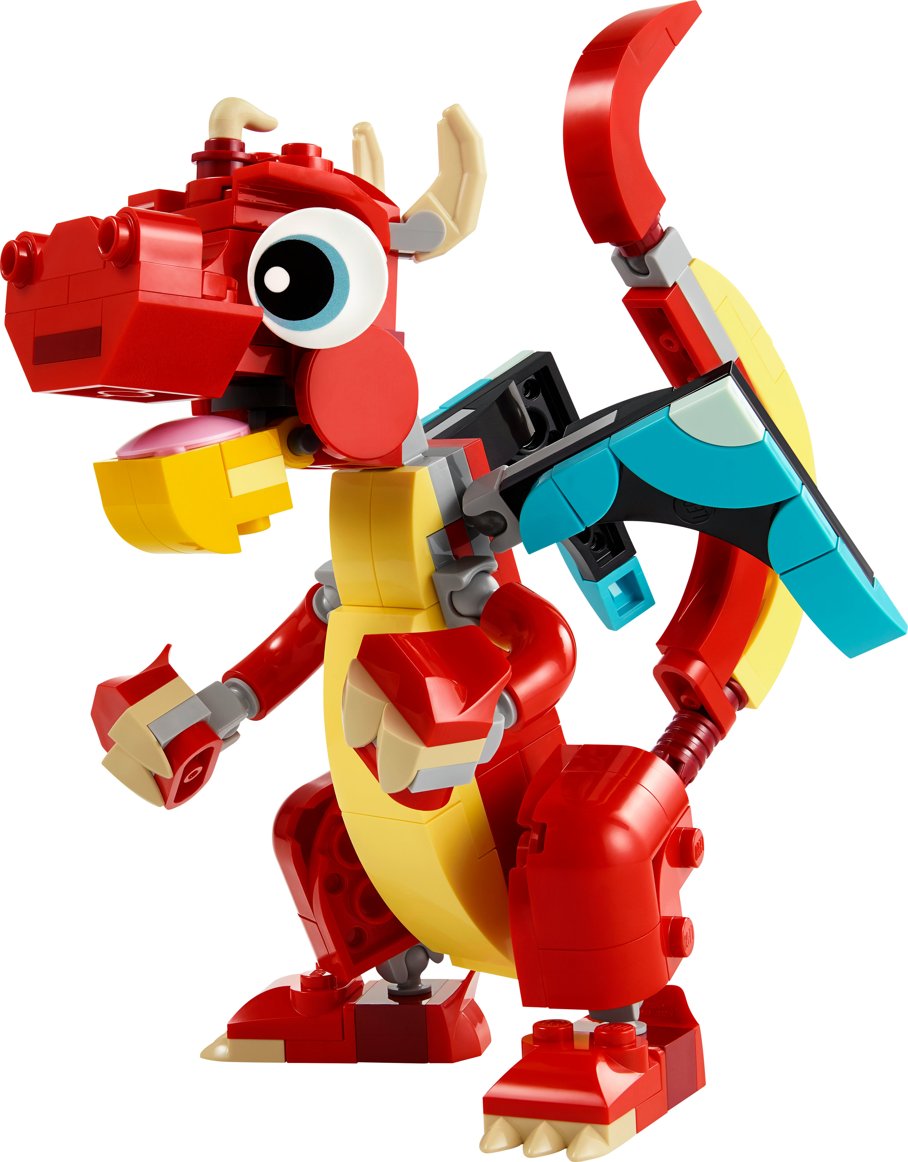 Juguete de Lego de dragón rojo y amarillo con ojo azul grande, boca abierta y cola grande. Fondo blanco.