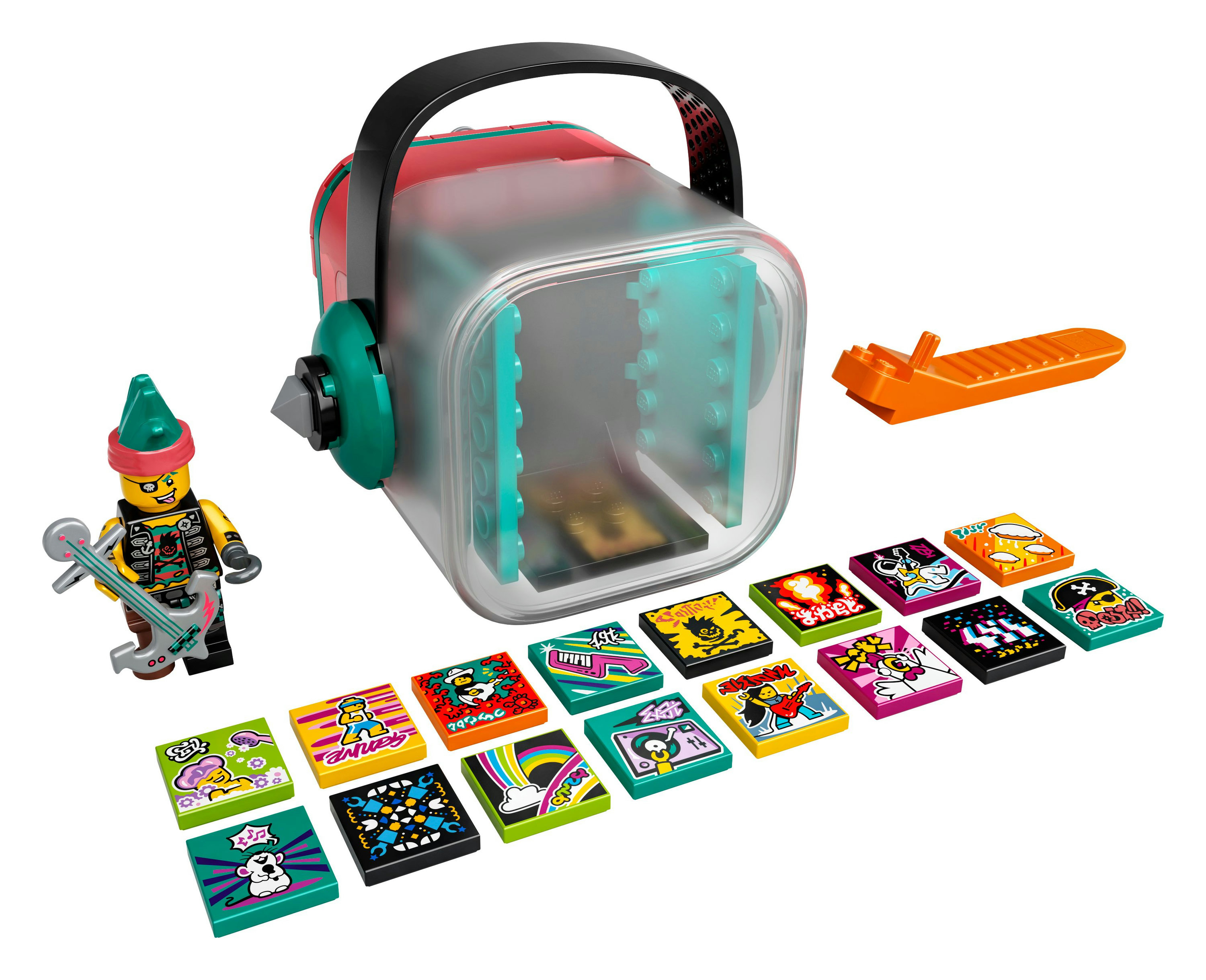 Lego-Set mit einer Figur, einer transparenten Box und bunten kassettenartigen Quadraten.