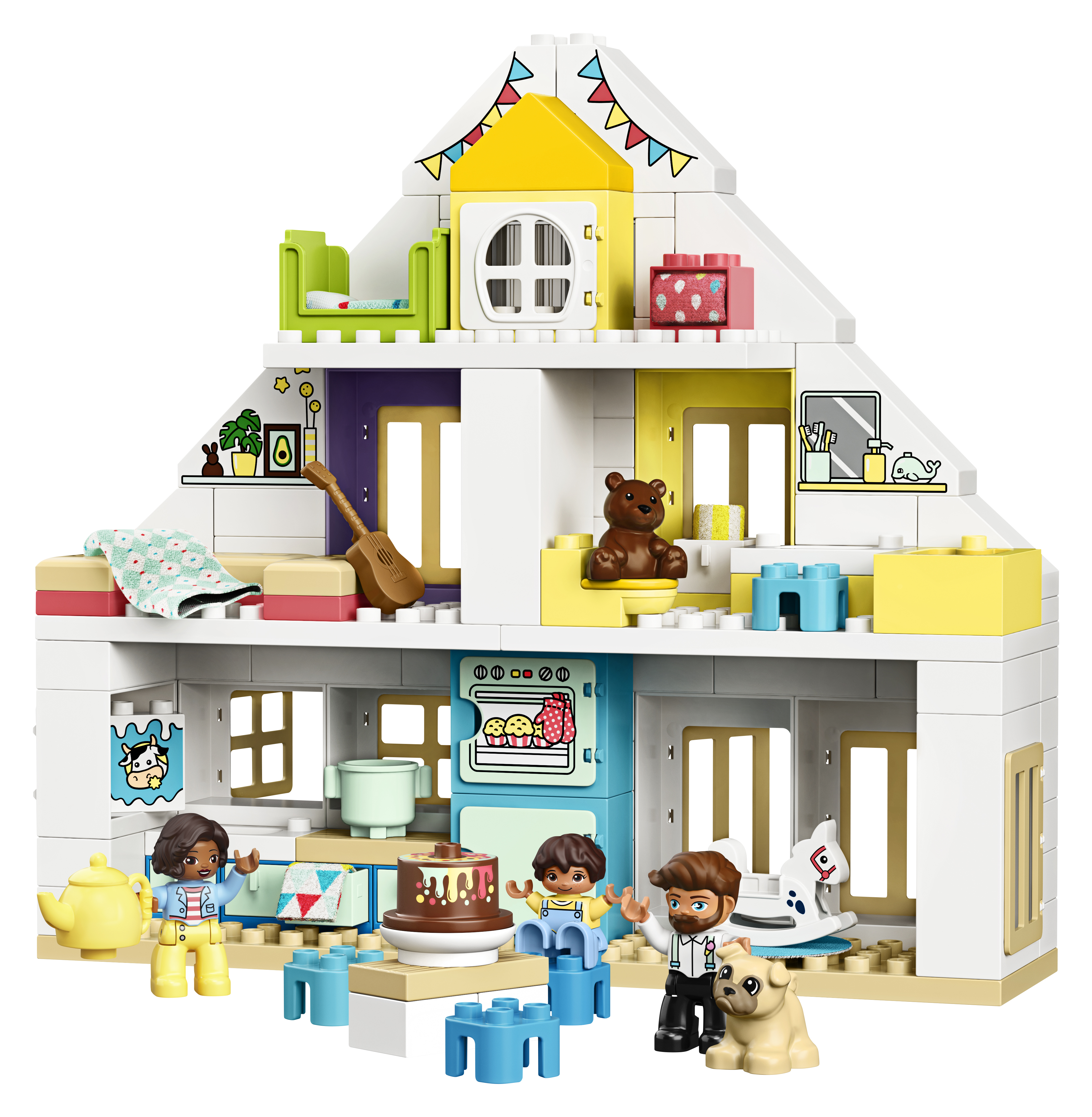 Une maison LEGO blanche avec des figurines de famille, des meubles et un gâteau.