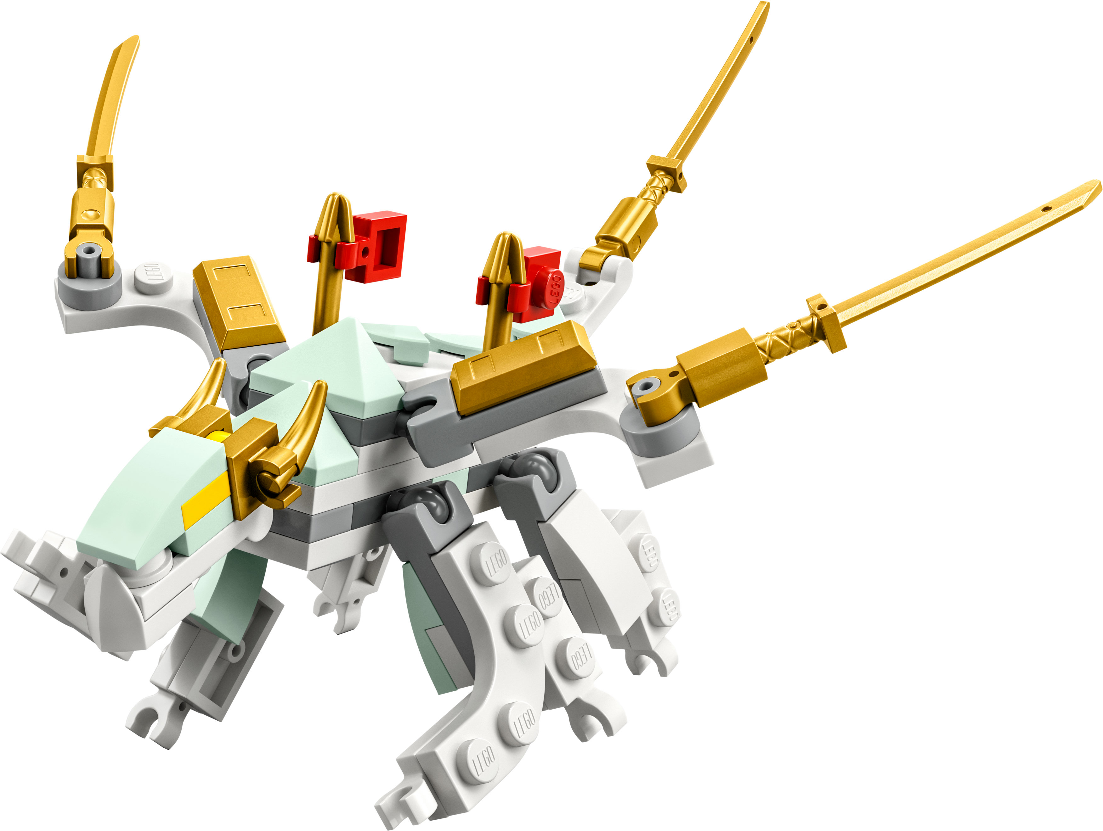 Beyaz, açık yeşil ve altın renginde bir Lego ejderha modeli. Altın boynuzları ve kılıçları, kırmızı detaylar var.