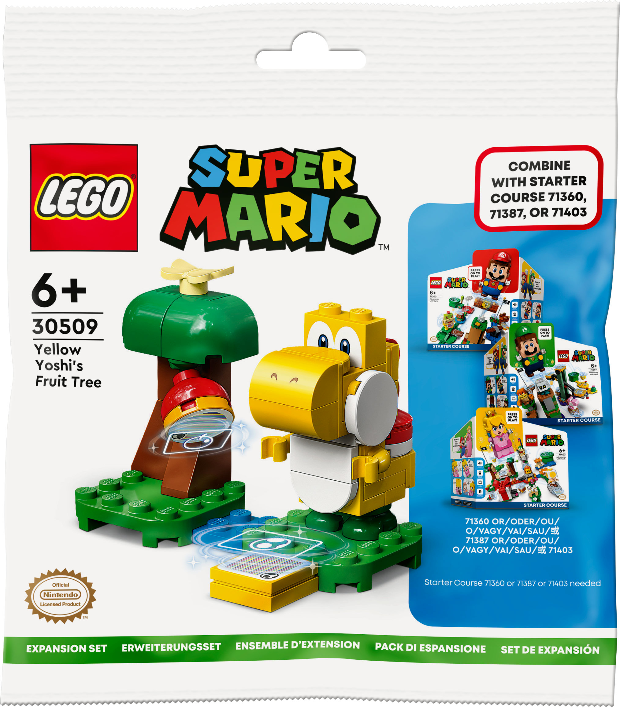 Set Lego Super Mario. Yoshi giallo con albero su base verde. Anche la scatola è visibile.