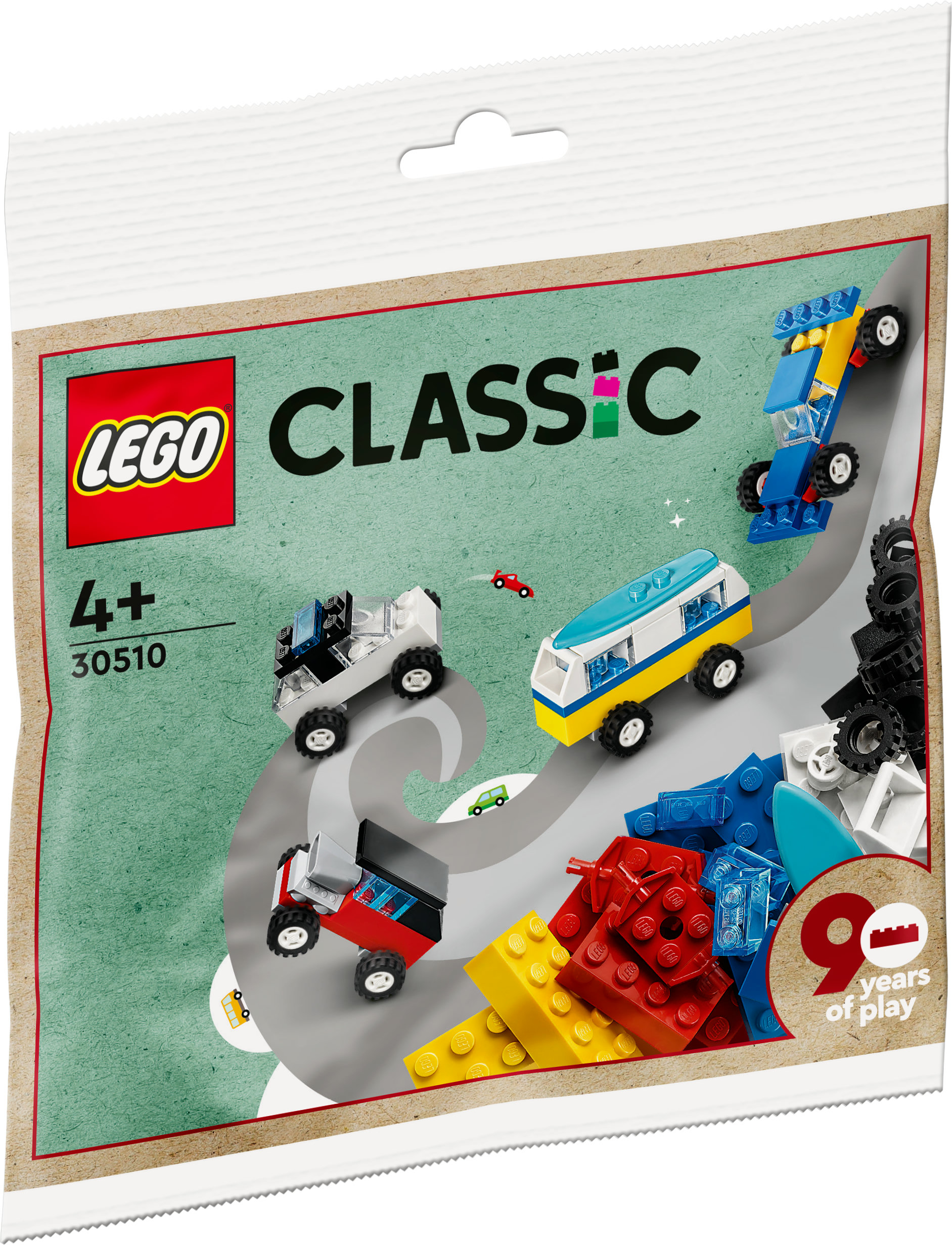 Lego Classic Set Verpackung. Zeigt 4 kleine Autos auf einer kurvenreichen Straße mit Lego Logo und 90 Jahre Text.