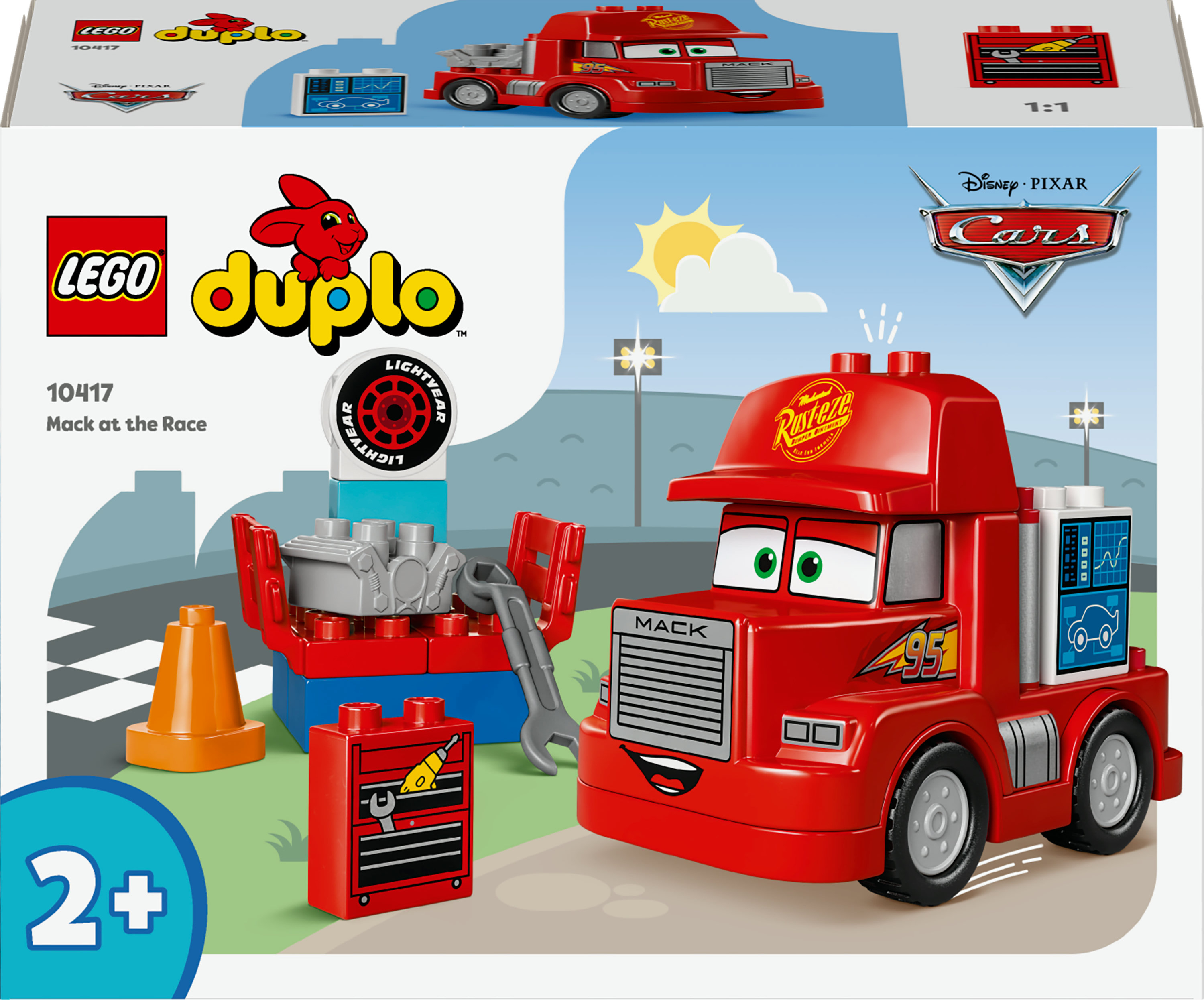 Lego Duplo doos met rode vrachtwagen, Mack, en racethema met gereedschapsset.