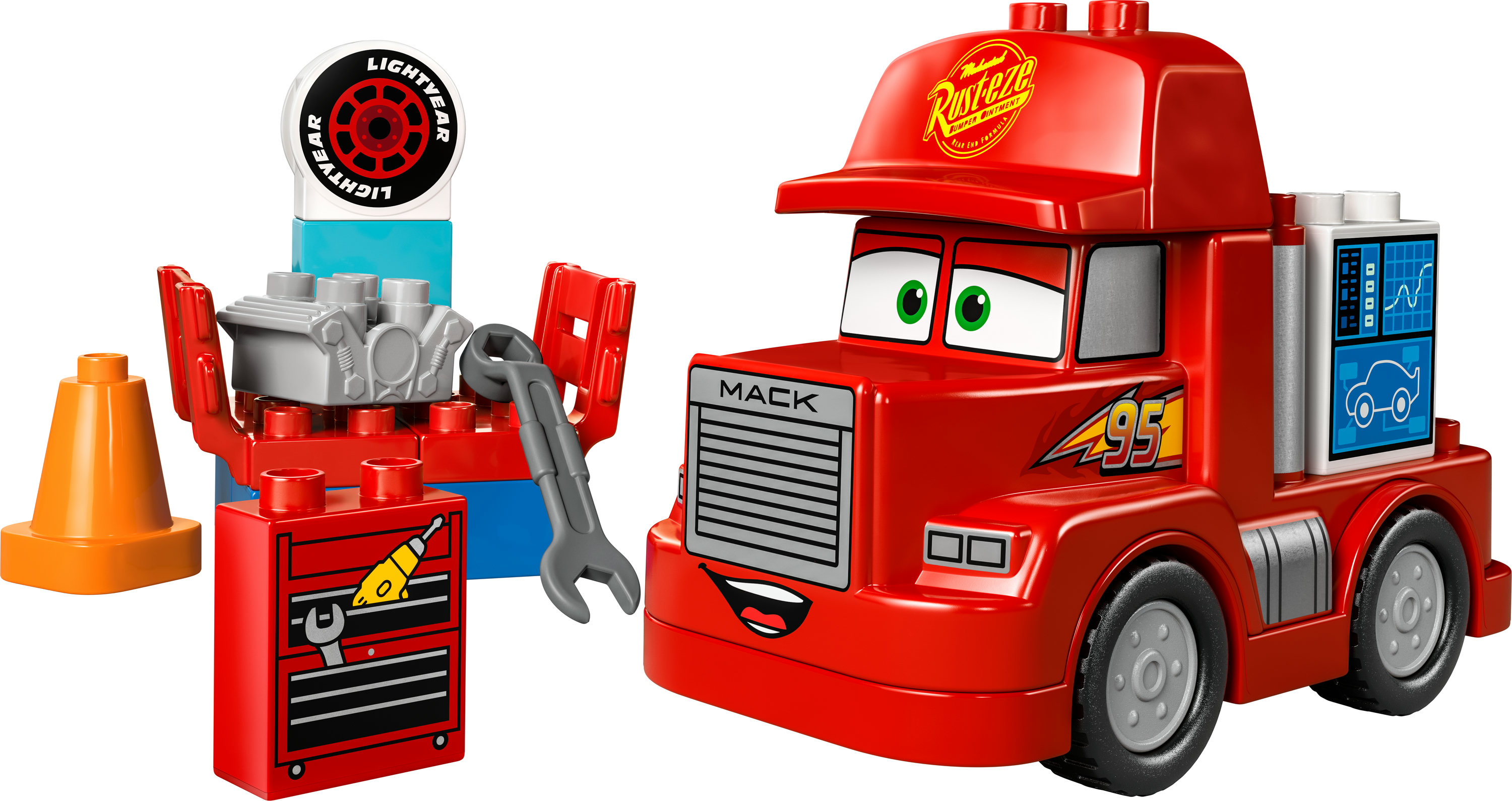 Rode Mack truck Lego set met gereedschap en gereedschapskist. Oranje kegel links.