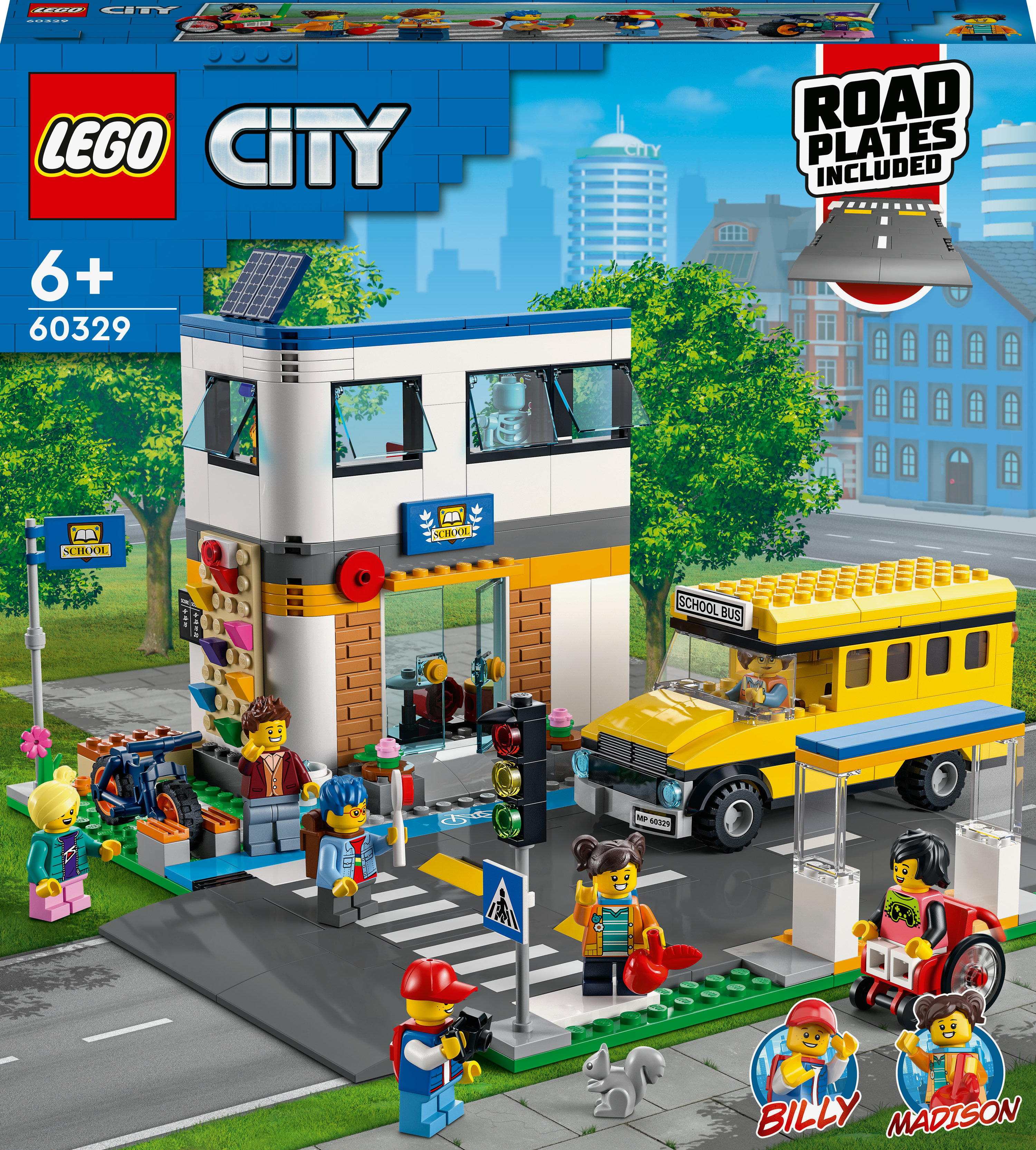 A Lego City set with a two-story building, a school bus, and minifigures of people and a squirrel.