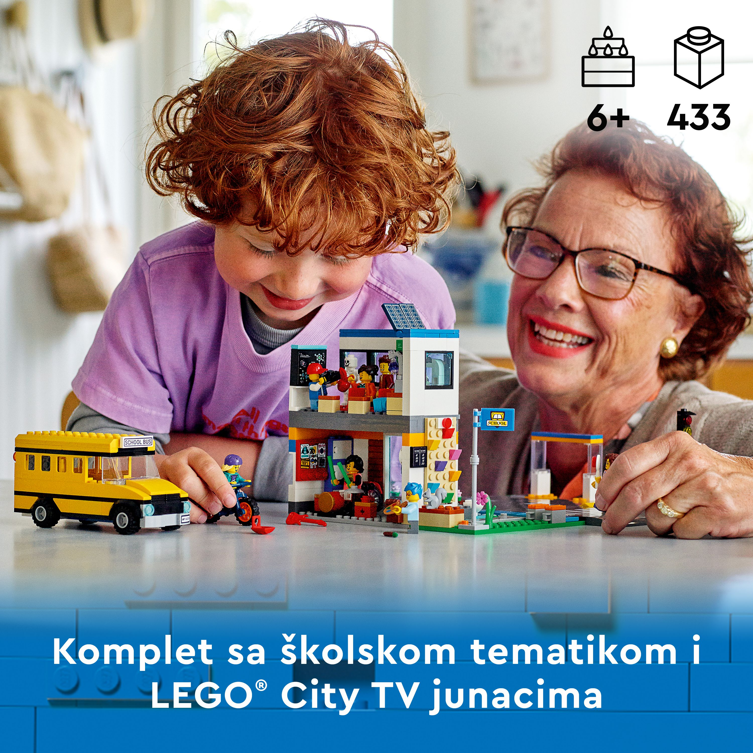 Lego City set: school-themed scene with figures, bus, and building. Child and adult interacting.