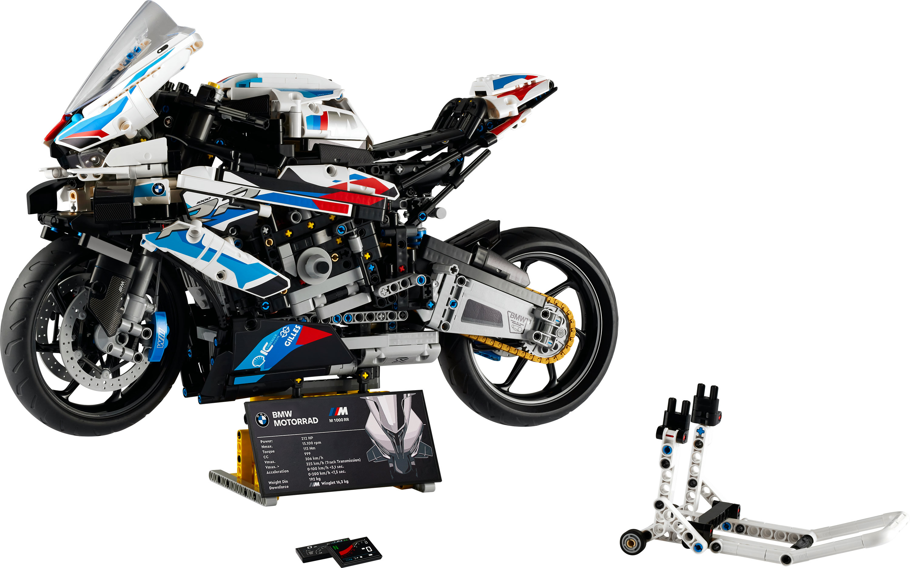 Model motocykla BMW Lego, biało-niebiesko-czerwony, ze stojakiem i panelem informacyjnym.