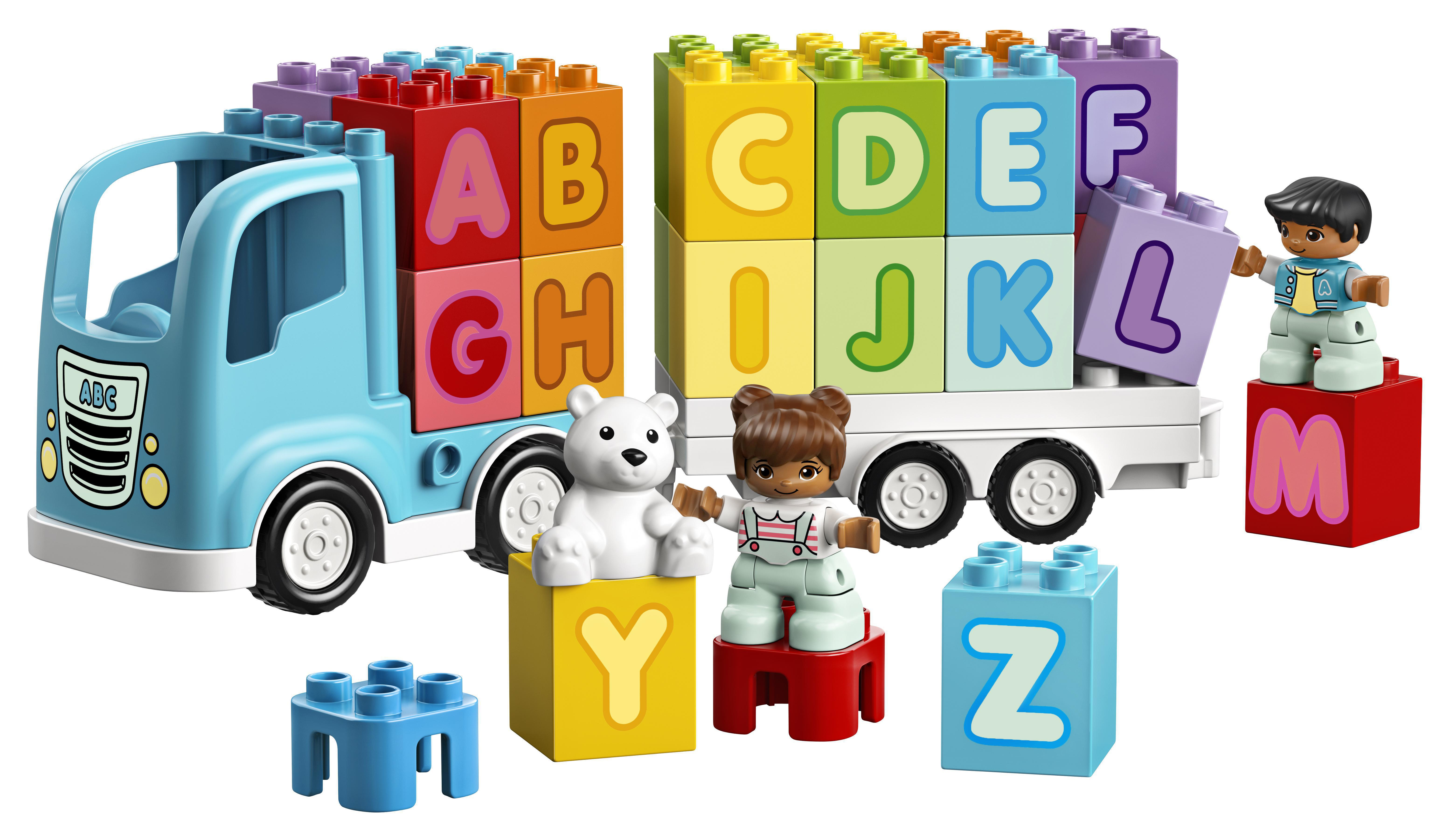 Lego Duplo Truck-Set. Enthält einen LKW mit Alphabetblöcken, Figuren und Tieren. Gegen Weiß.