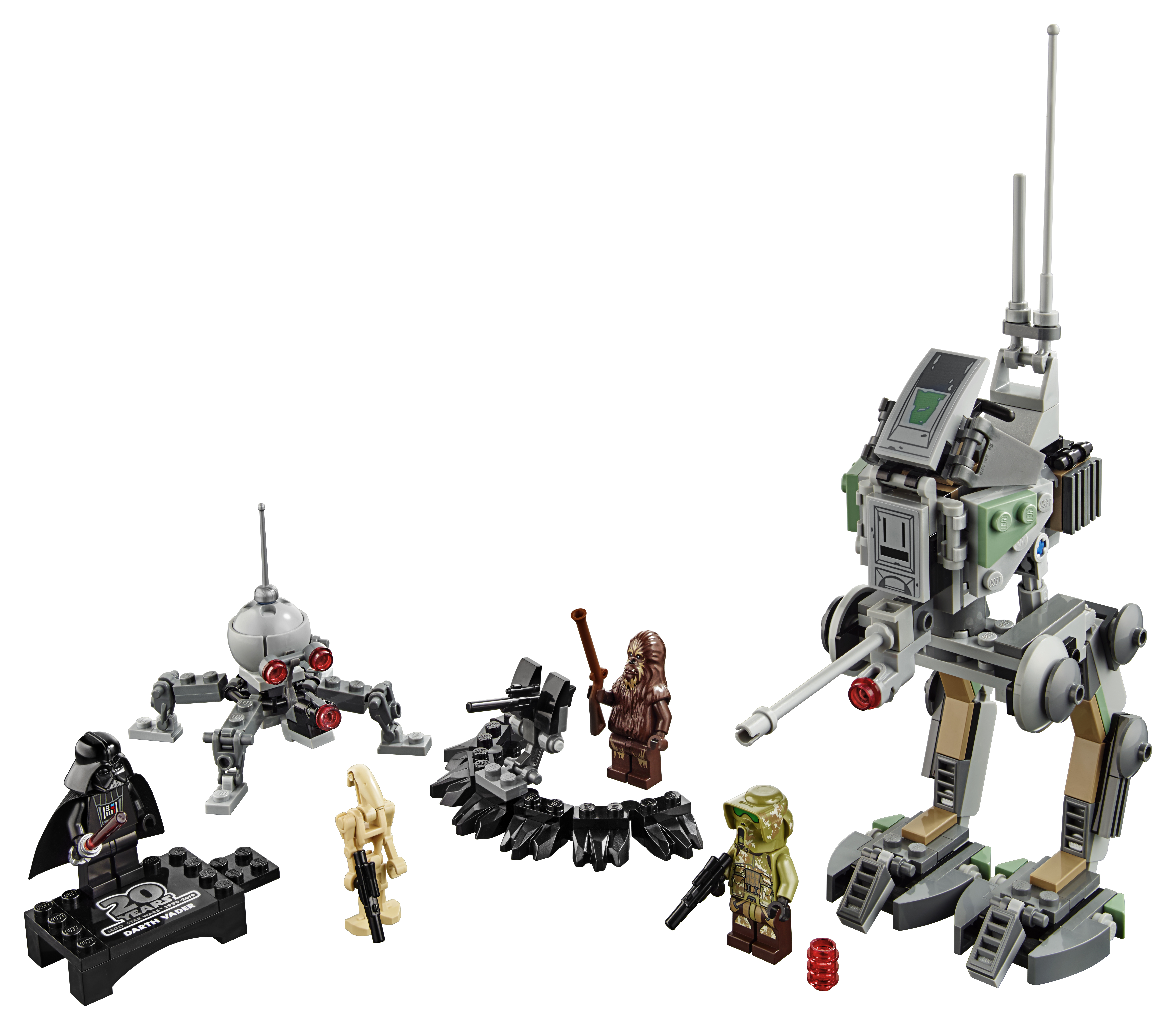Lego Star Wars set with various figures including Darth Vader and a large walker.