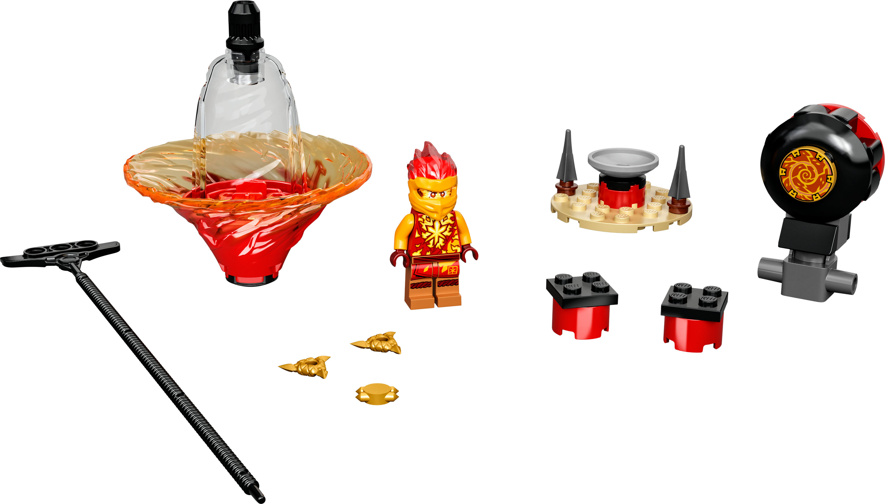 Ensemble Lego Ninjago avec une toupie, une figurine ninja et divers accessoires.