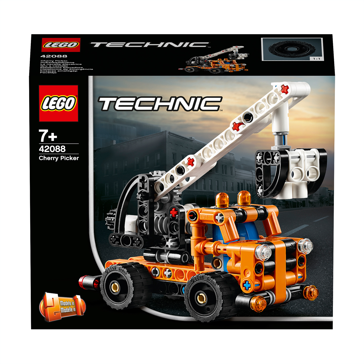 Lego Technic Cherry Picker set on a black background. Orange and black details.