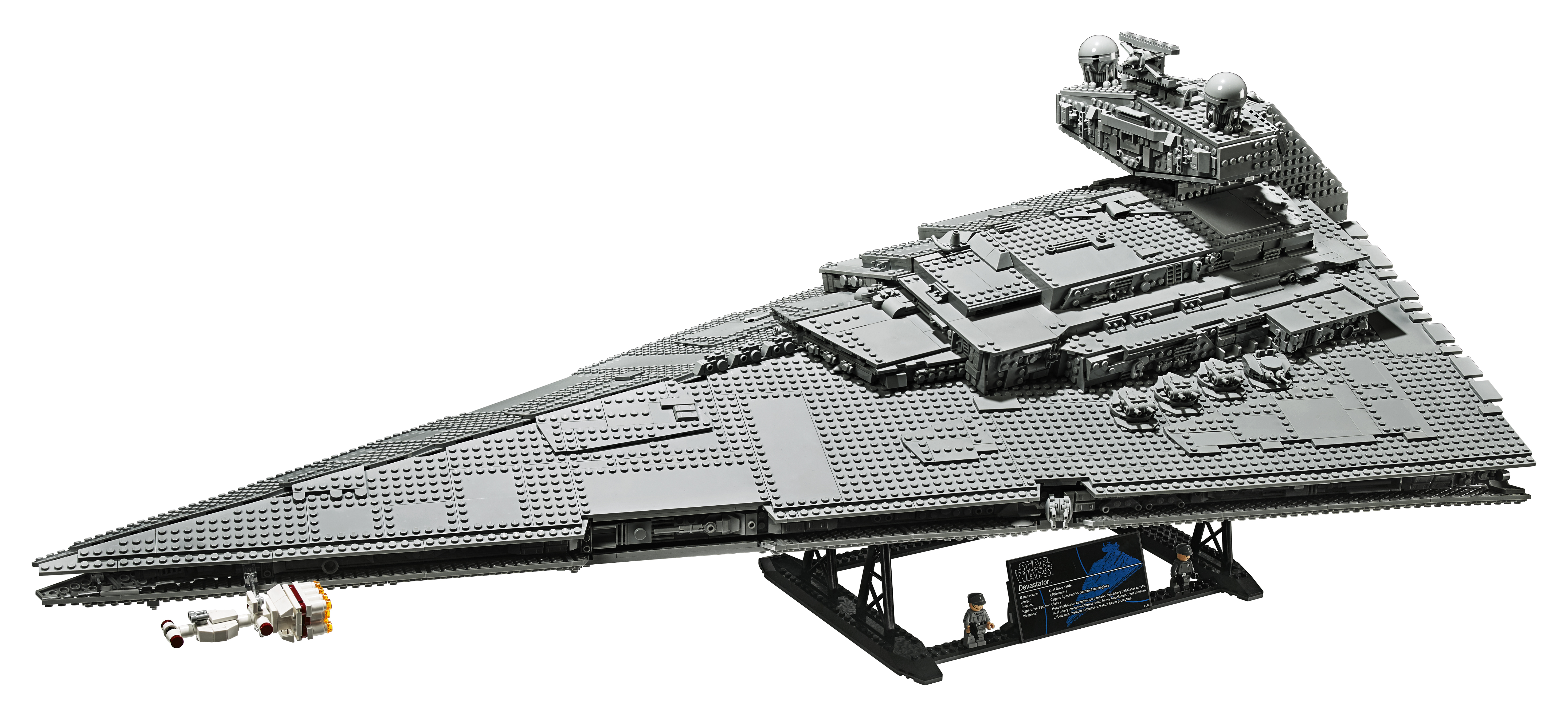 Duży model Lego Star Destroyer. Szary statek kosmiczny na czarnym stojaku. Białe tło.