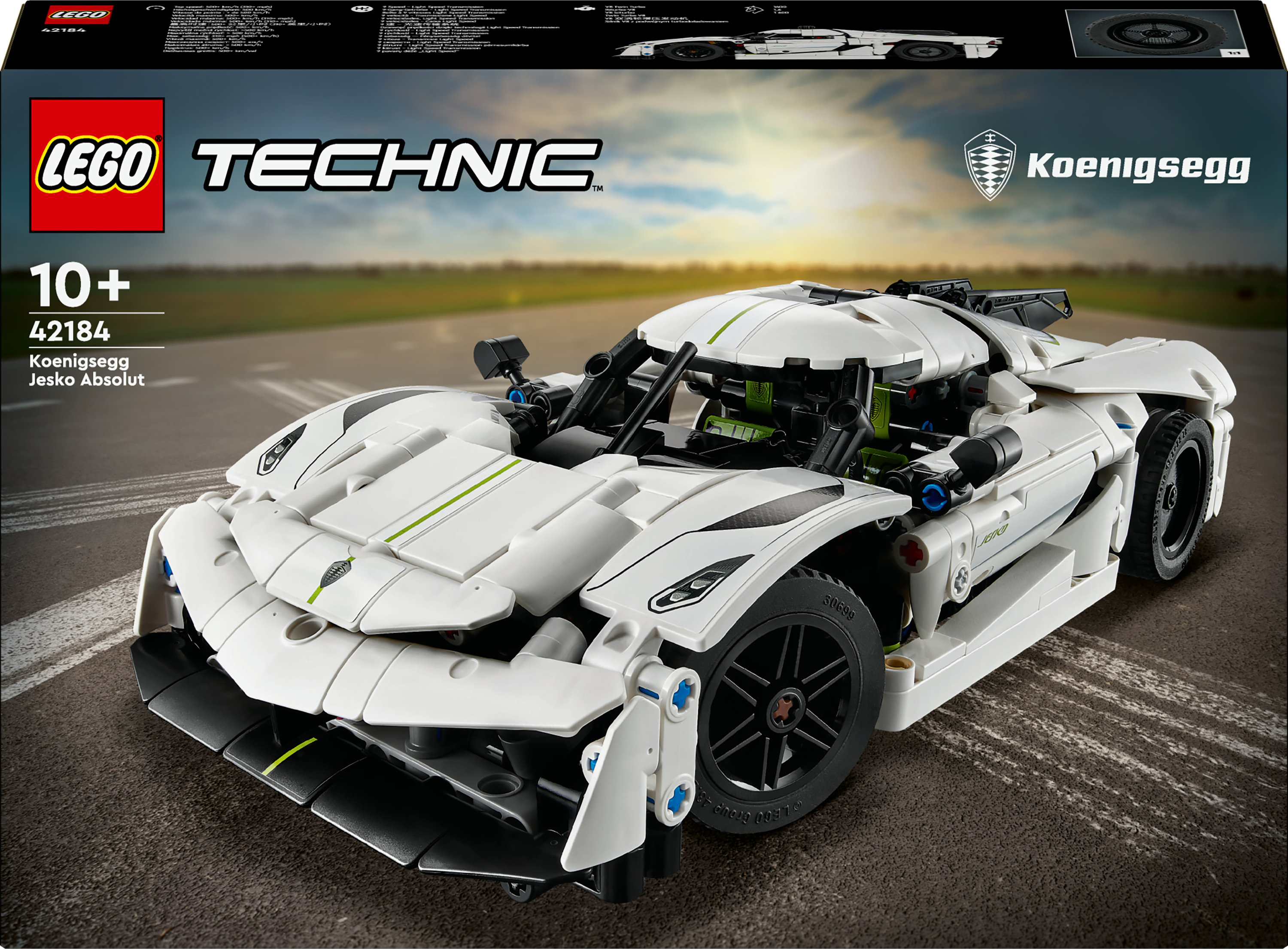 Un modèle de voiture Lego blanc sur fond de circuit.
