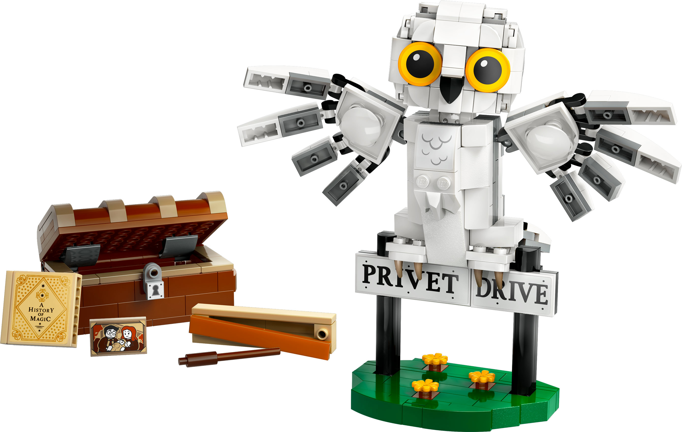 Zestaw Lego z dużą białą sową z otwartymi skrzydłami na znaku 'PRIVET DRIVE'.