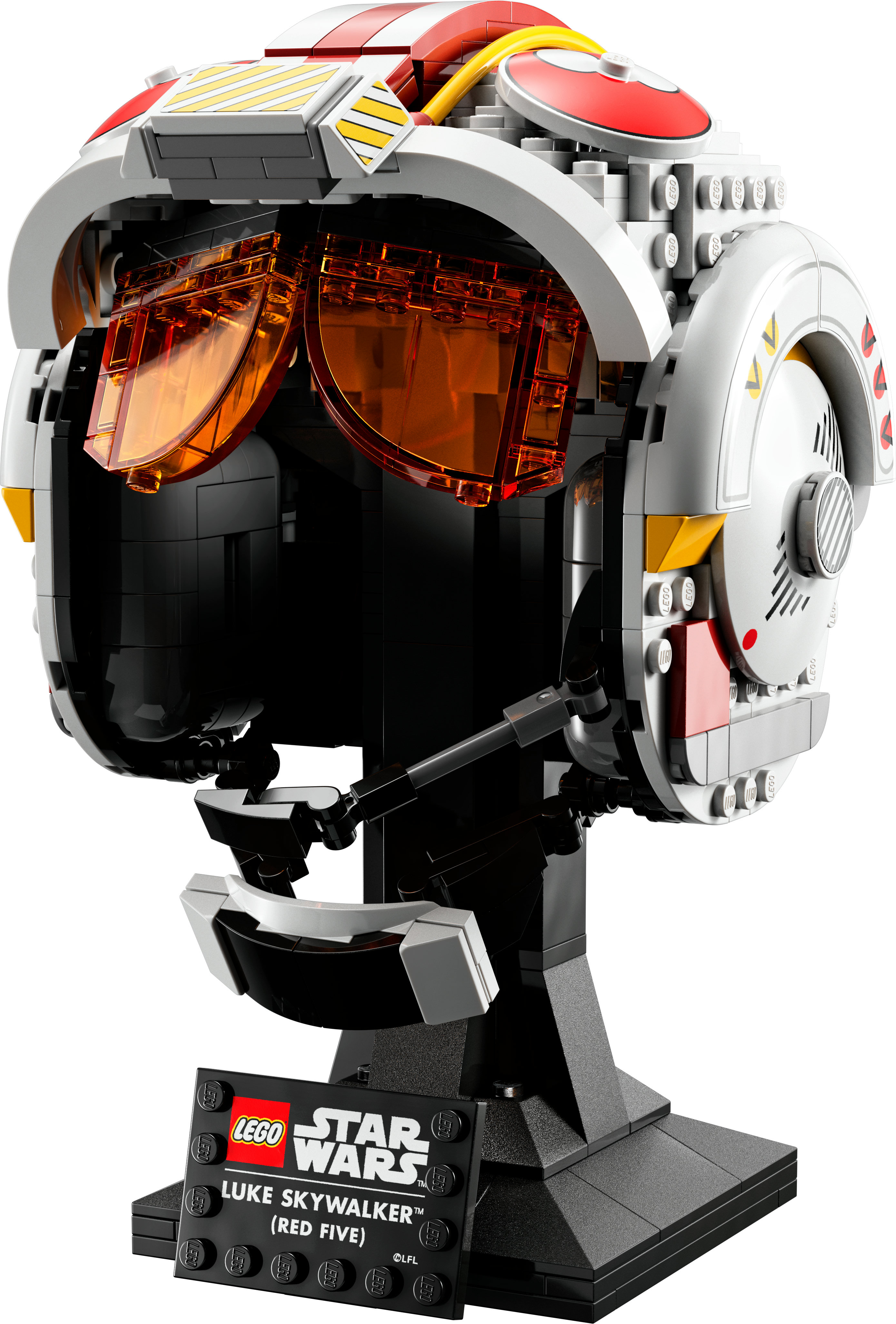 Kask Lego Star Wars Luke'a Skywalkera, z czarnym stojakiem i tabliczką znamionową.