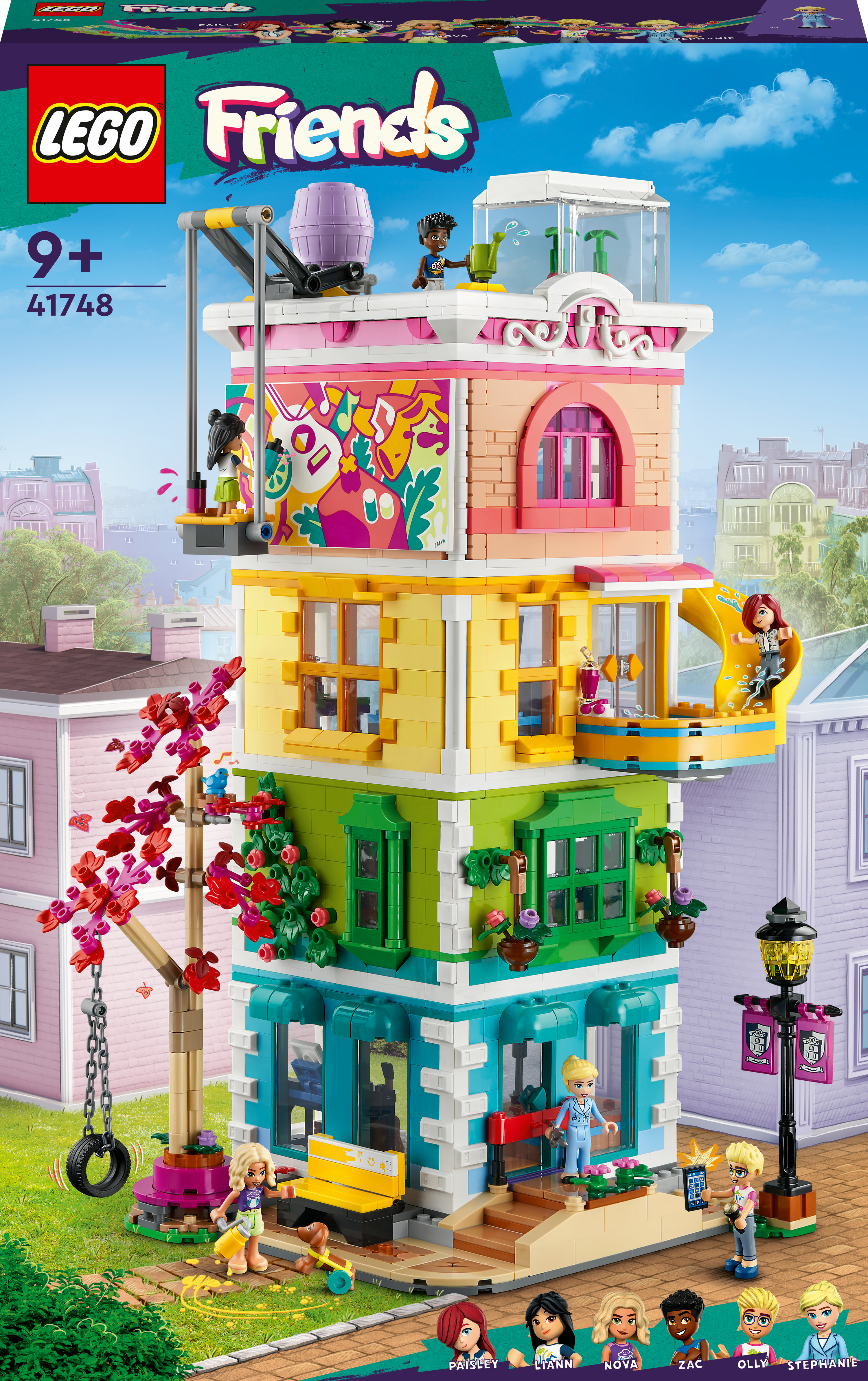 Zestaw Lego Friends. Wielopiętrowy budynek z figurkami, zjeżdżalnią i drzewem.