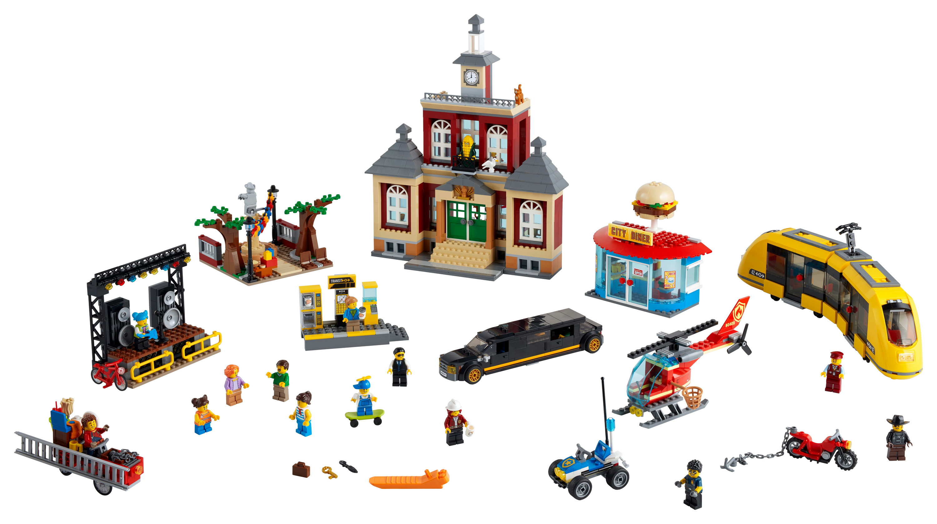 Zestaw Lego City: Budynki, figurki, pojazdy i pociąg w scenerii miejskiej.