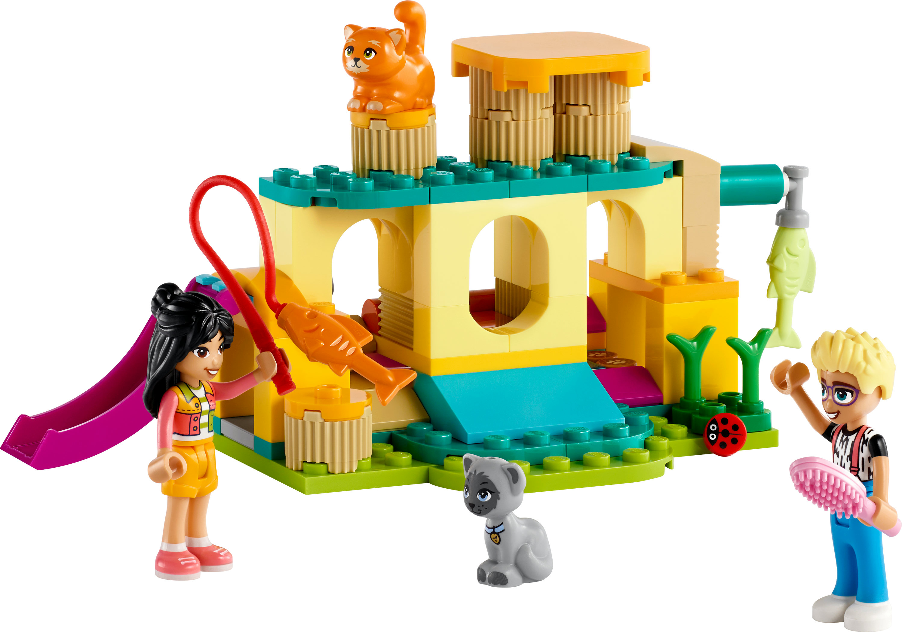 Lego Friends Set, das ein Gebäude mit Figuren, Katze, Hund und Zubehör zeigt.