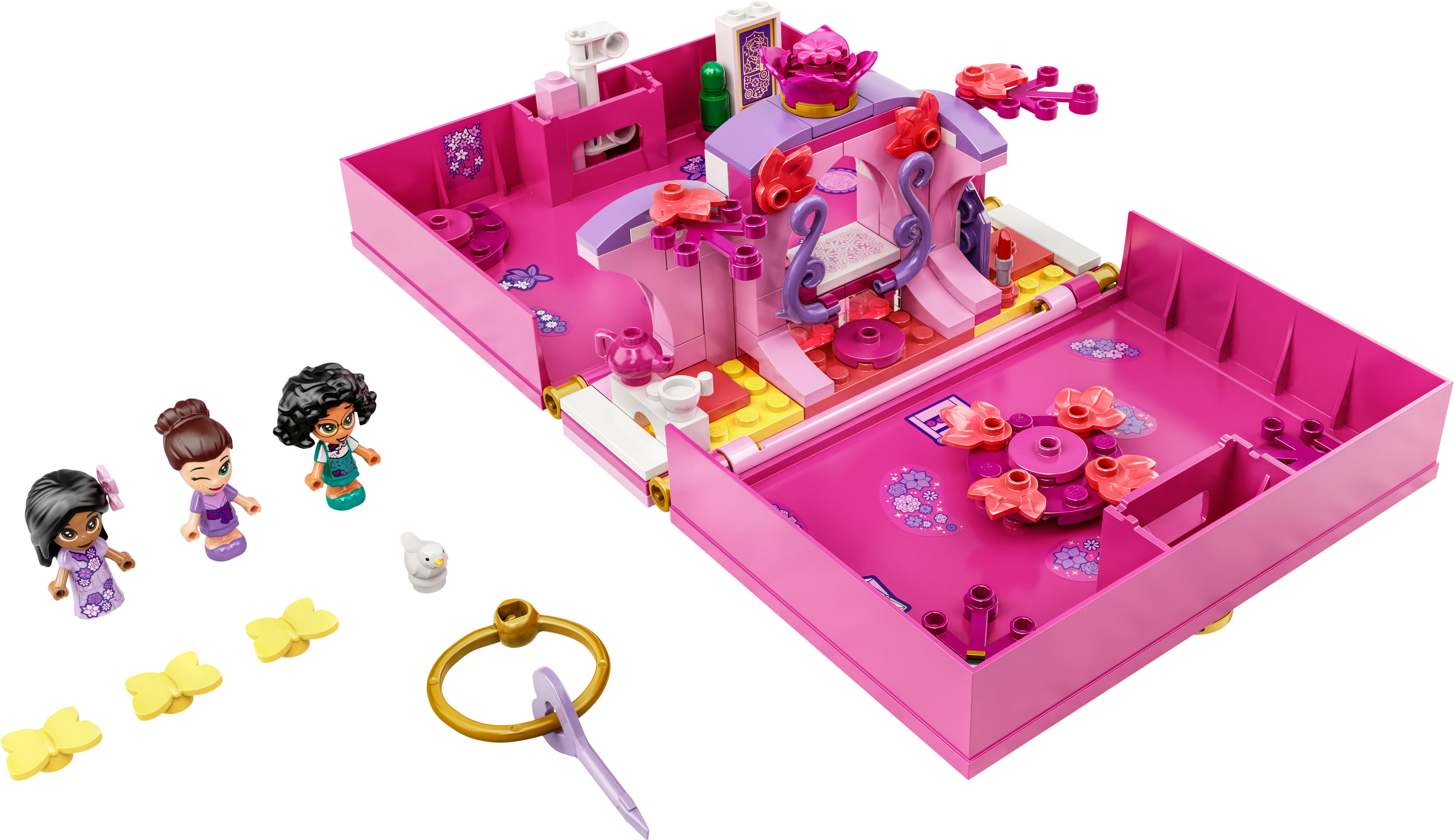 İçinde bir oda bulunan, açık pembe bir kutunun Lego seti, figürler ve aksesuarlarla birlikte.