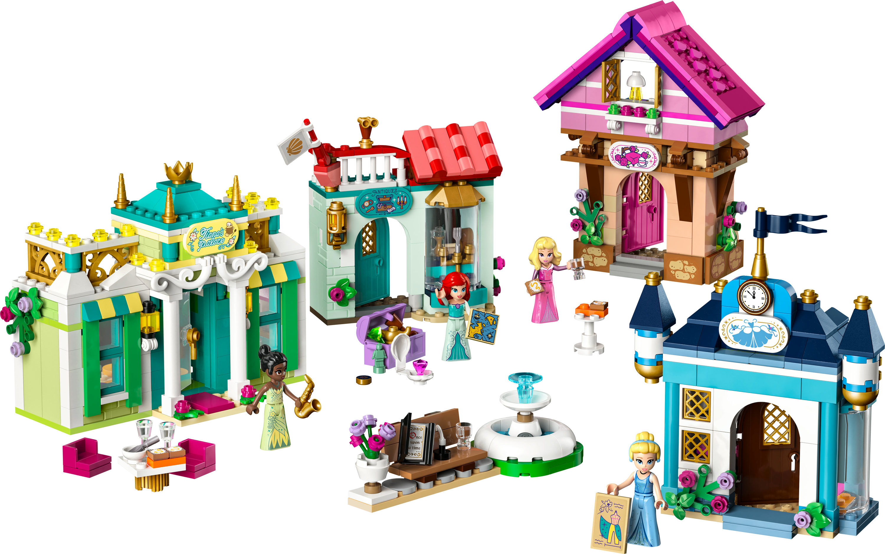 Zestawy Lego Disney Princess: sklepy i figurki. Różne kolorowe fasady budynków. Białe tło.