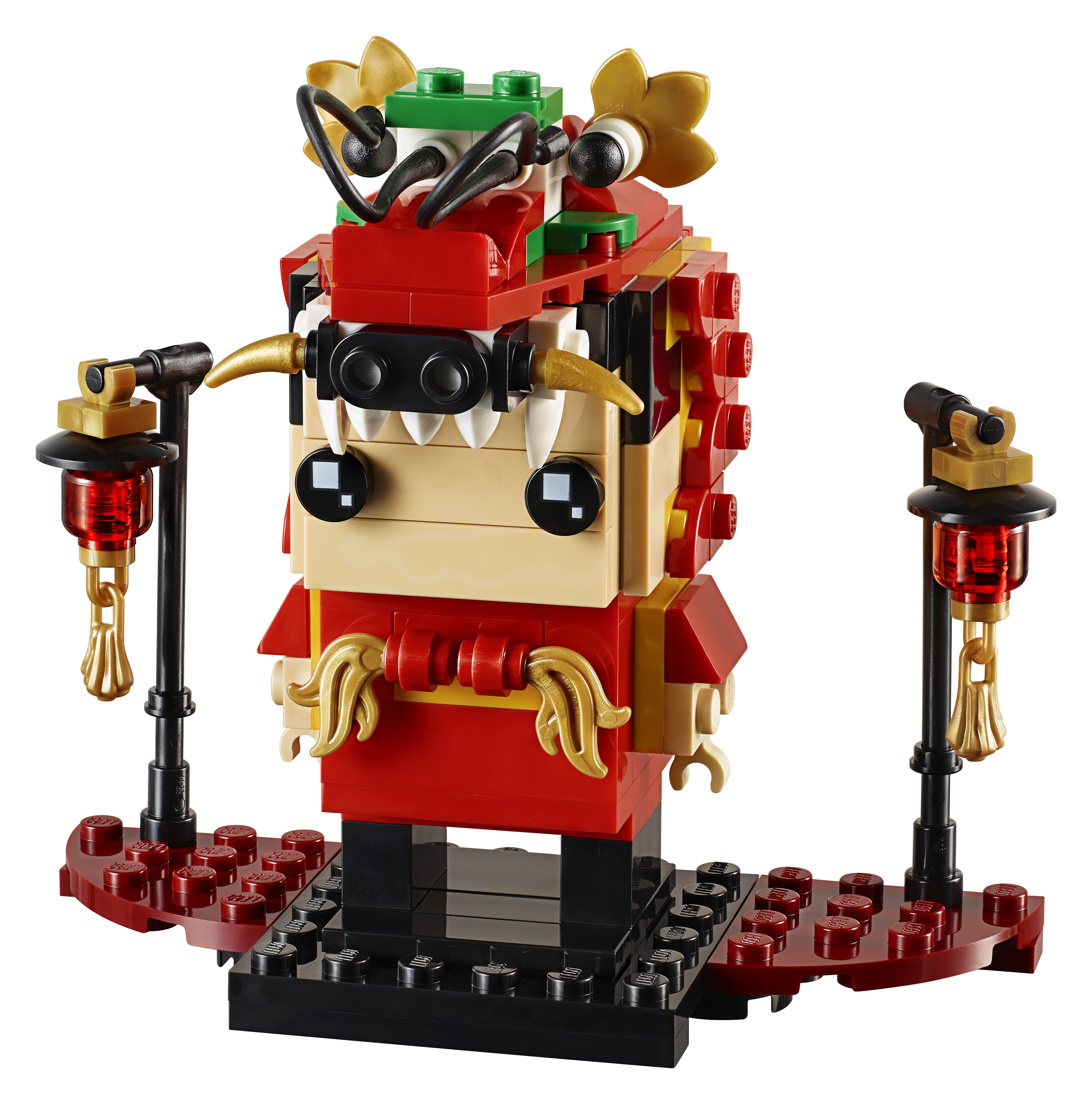 Una figura Lego a forma di drago con accenti rossi e oro, con lanterne su base nera.