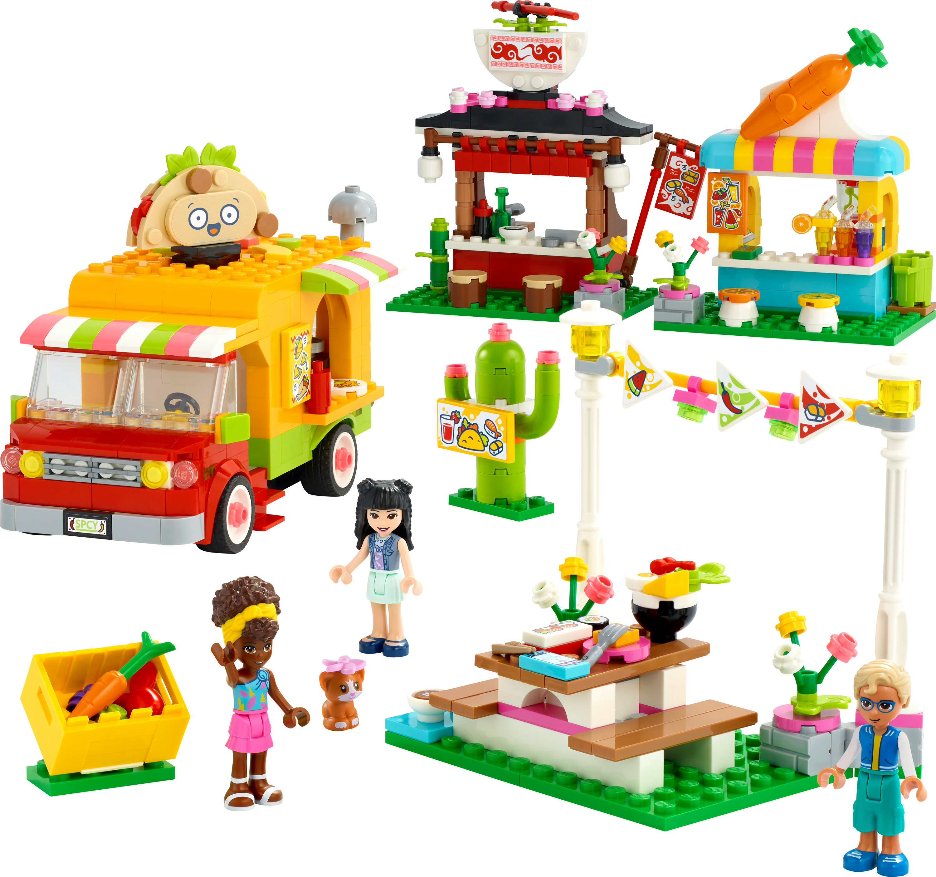 Lego Friends Set mit Imbisswagen, Picknicktisch und Figuren von Menschen und Tieren.