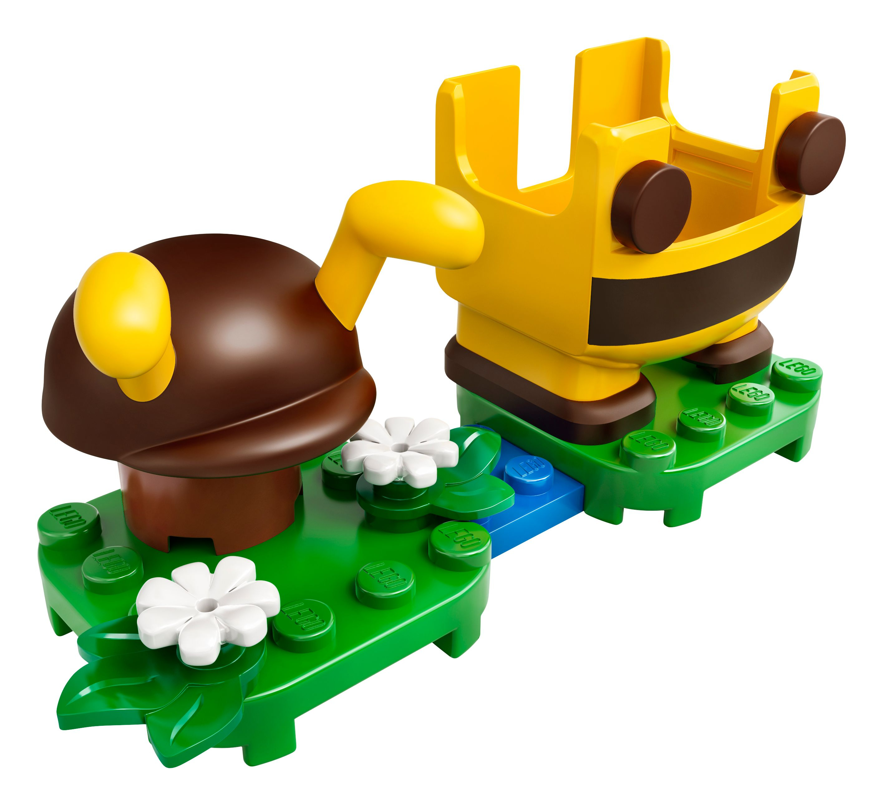 Set Lego con un carrello a tema api, fungo marrone e fiori bianchi su base verde, sfondo bianco.