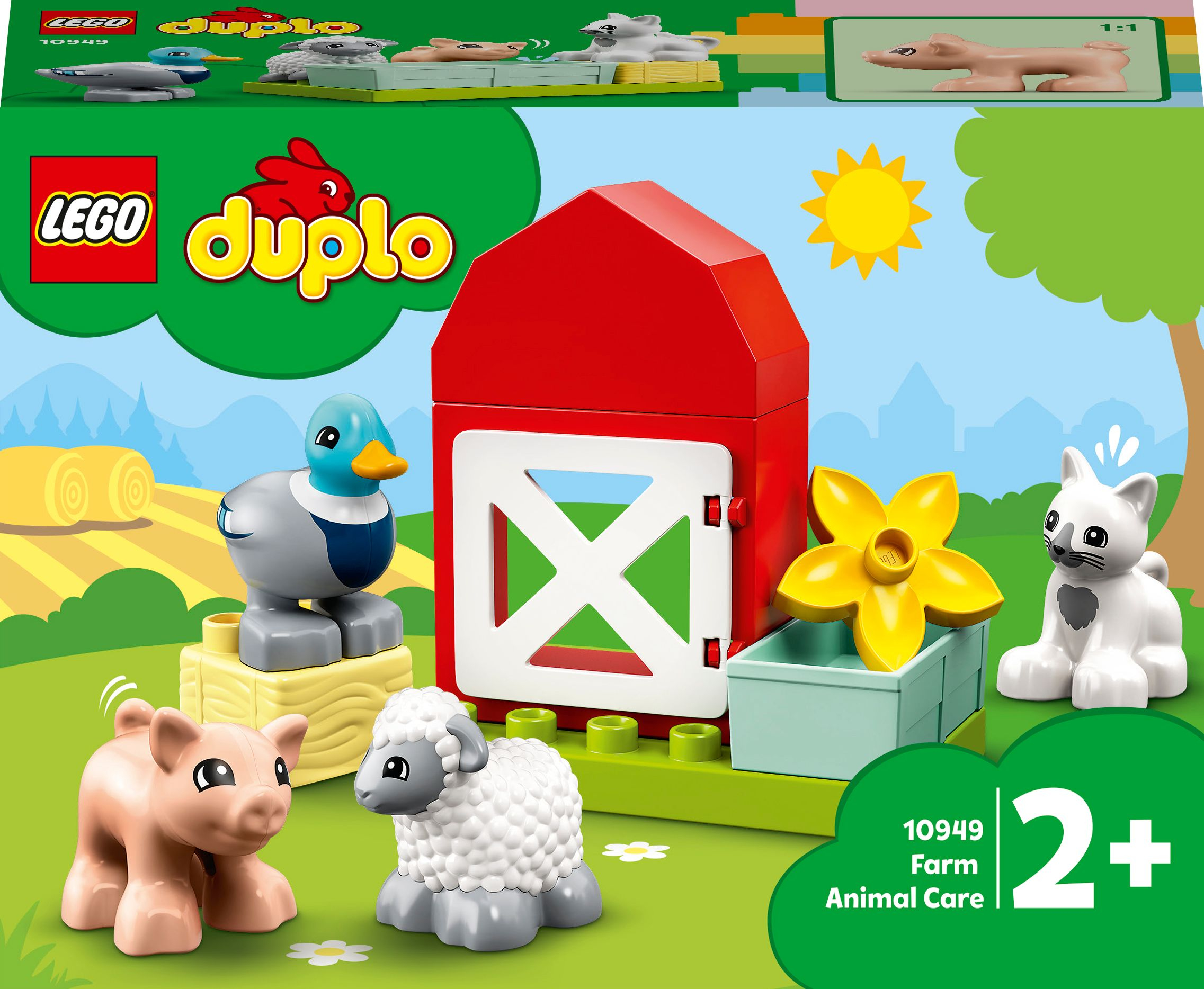 LEGO Duplo Set. Eine rote Scheune, Ente, Schwein, Schaf, Katze und Blumen werden gezeigt.