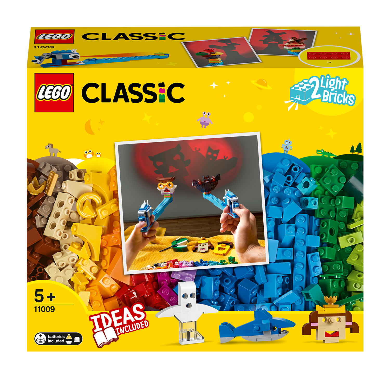 LEGO Classic Set Box mit verschiedenen bunten Steinen und Baubeispielen, einschließlich Lichtsteinen.
