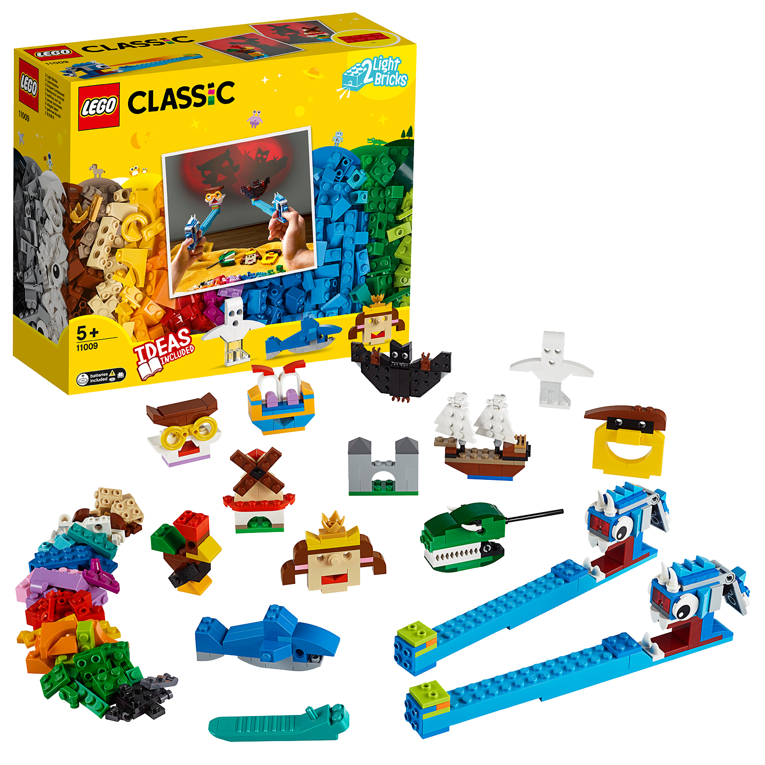 Ein Lego Classic Set mit verschiedenen Lego-Teilen und einer Box mit einem Gemälde.