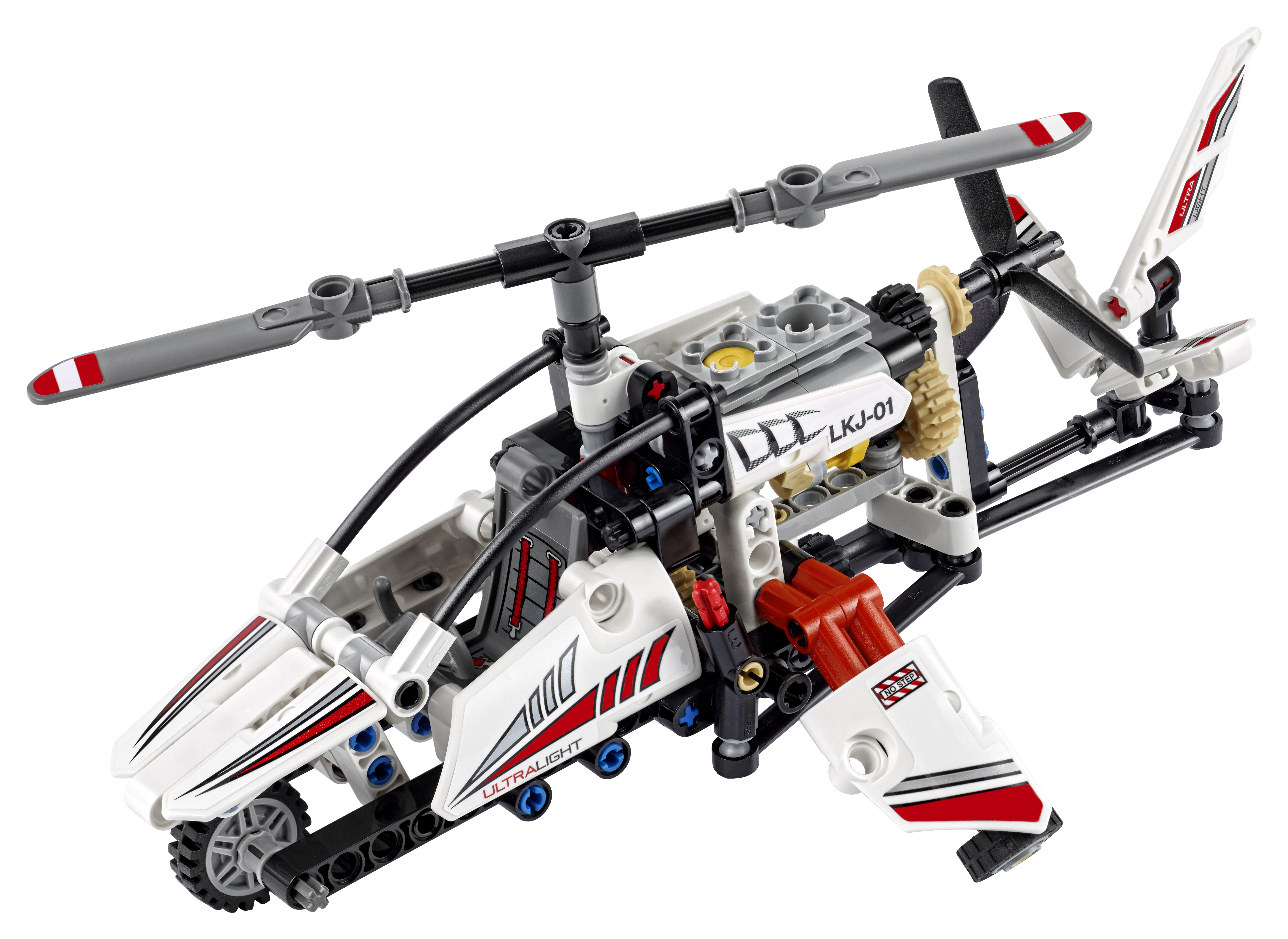 Biało-czerwony helikopter Lego z szarym wirnikiem i ogonem.