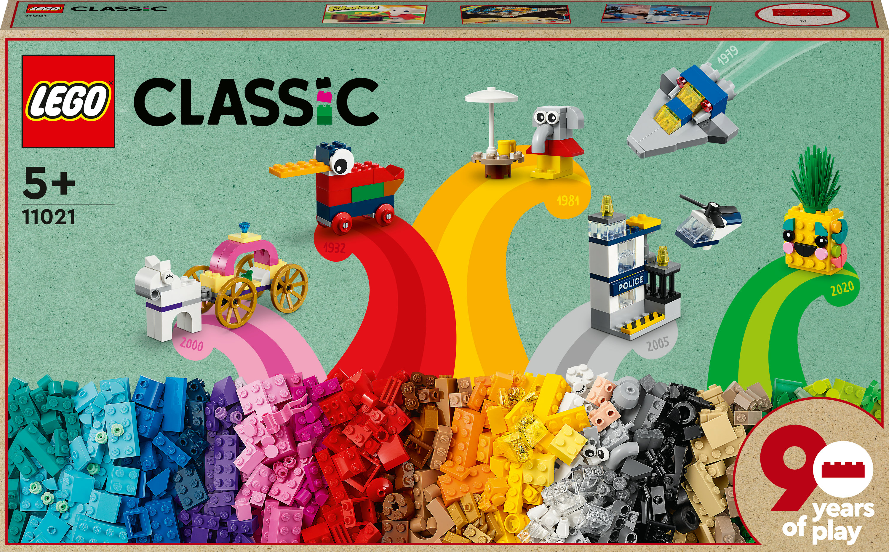 Renkli Lego modelleri ve tuğlaları olan Lego Classic kutusu. Lego logosu ile gökkuşağı teması.