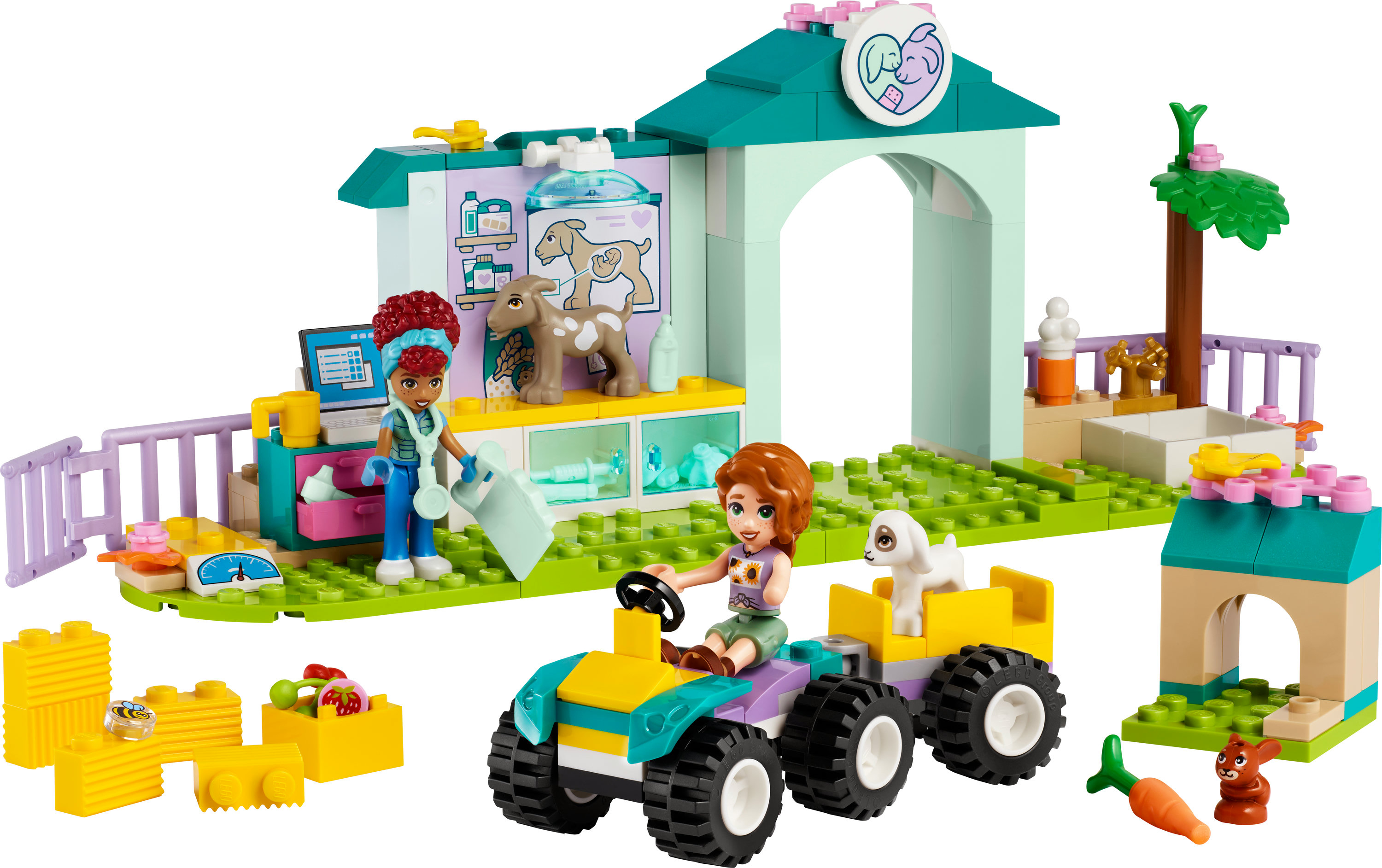 Bir Lego Friends seti, parlak renklerde figürler, bir ATV ve hayvanlarla birlikte bir veteriner kliniği gösteriyor.