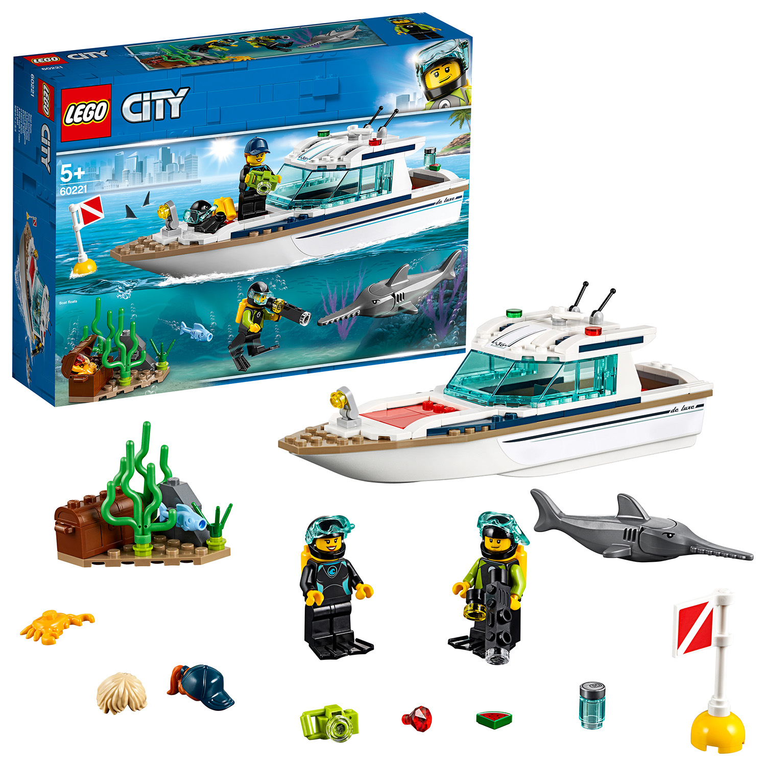 Lego City set met boot, duikers, haai en diverse accessoires.